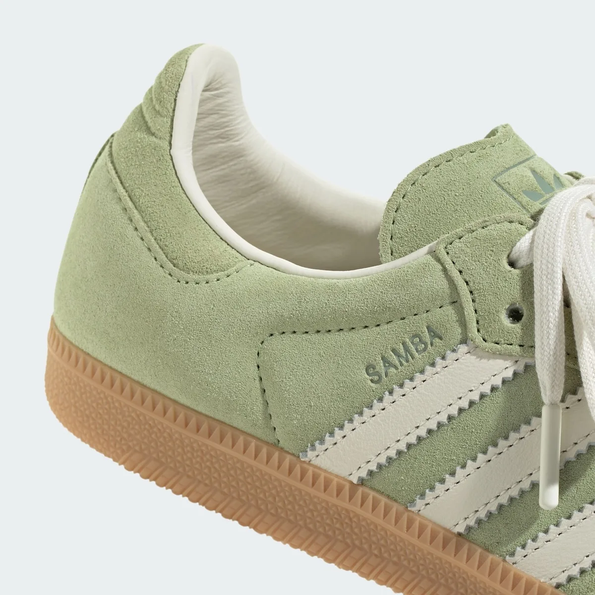 Heel detail of green suede with SAMBA text, cream serrated stripes and gum sole, Matcha