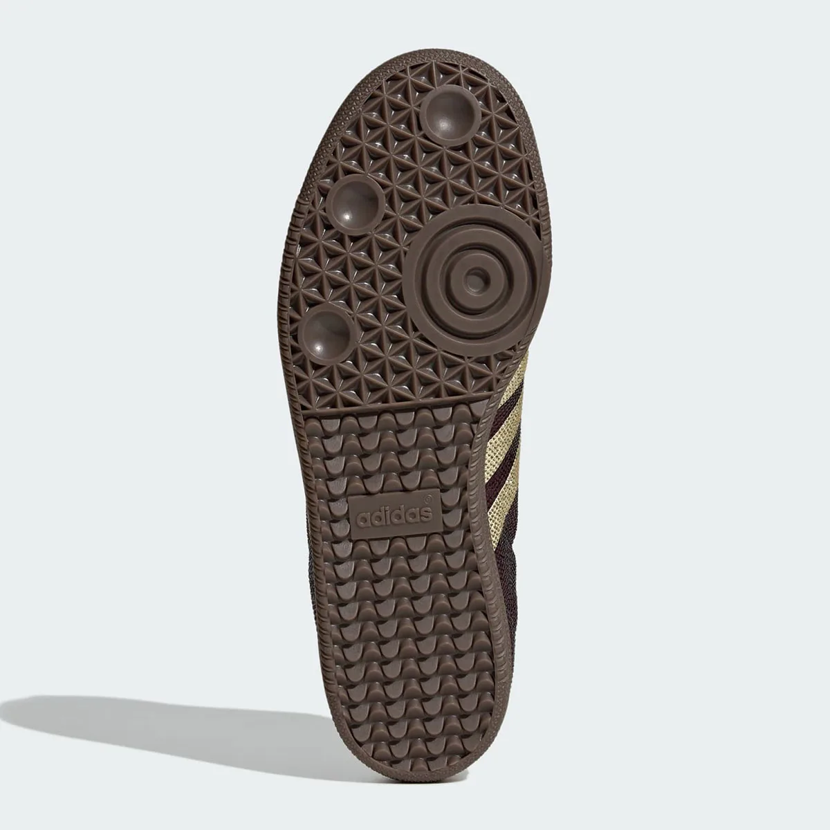 Outsole view, brown gum rubber with triangle pattern, round pods and adidas logo, Rhinestone