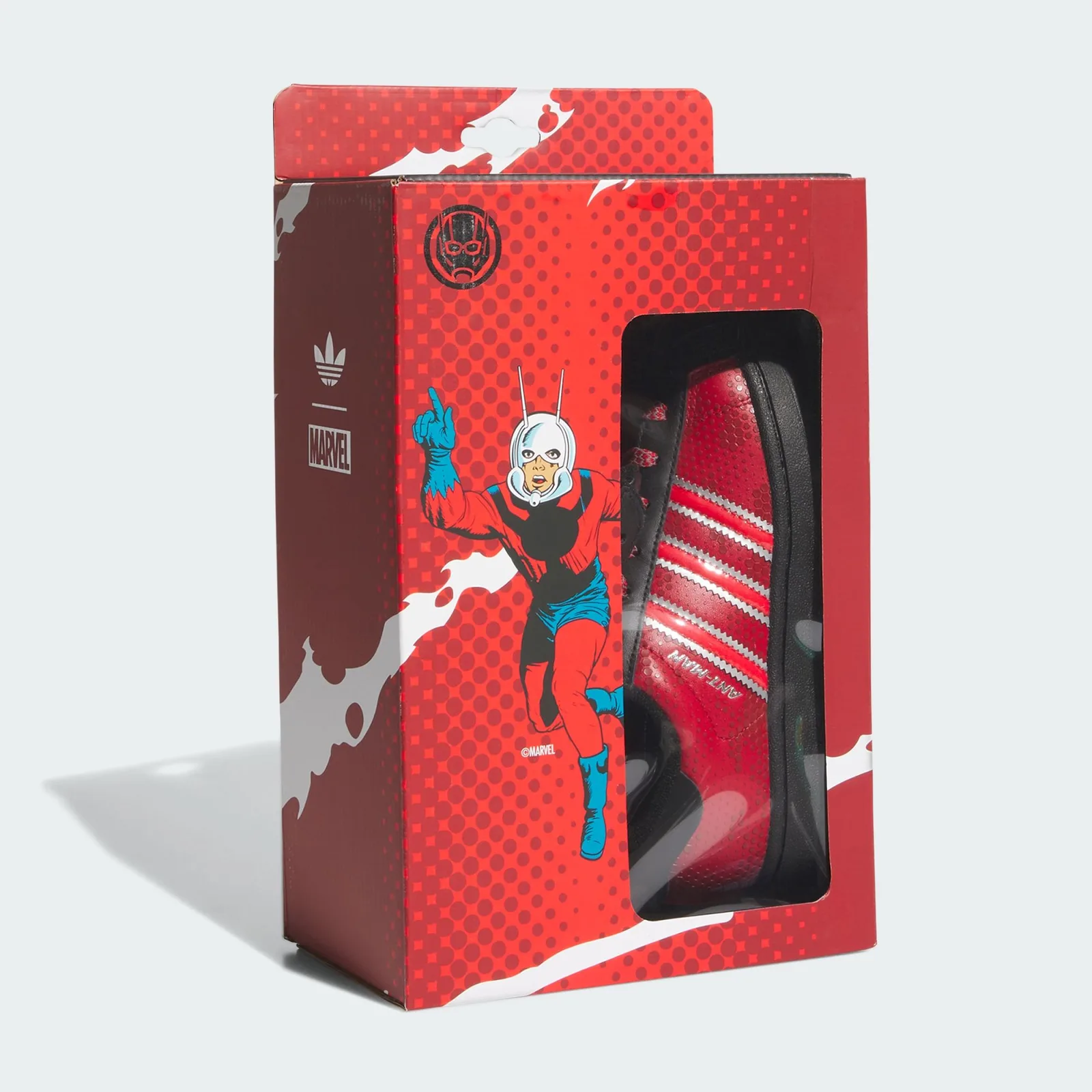 Packaging with red Ant-Man artwork and a window showing the sneaker, Ant Man