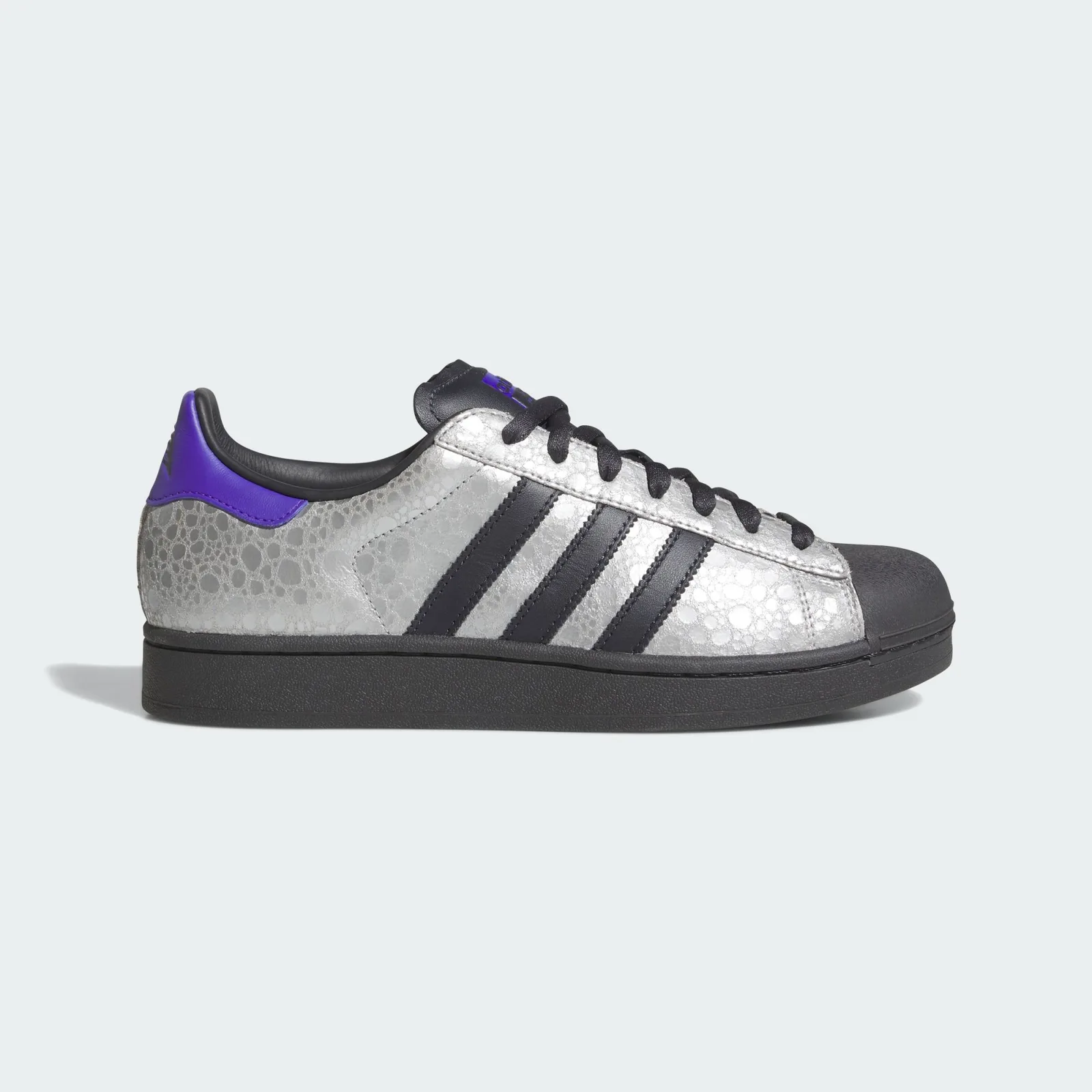 lateral view, silver crackled upper, black stripes and sole, purple heel tab, Stone