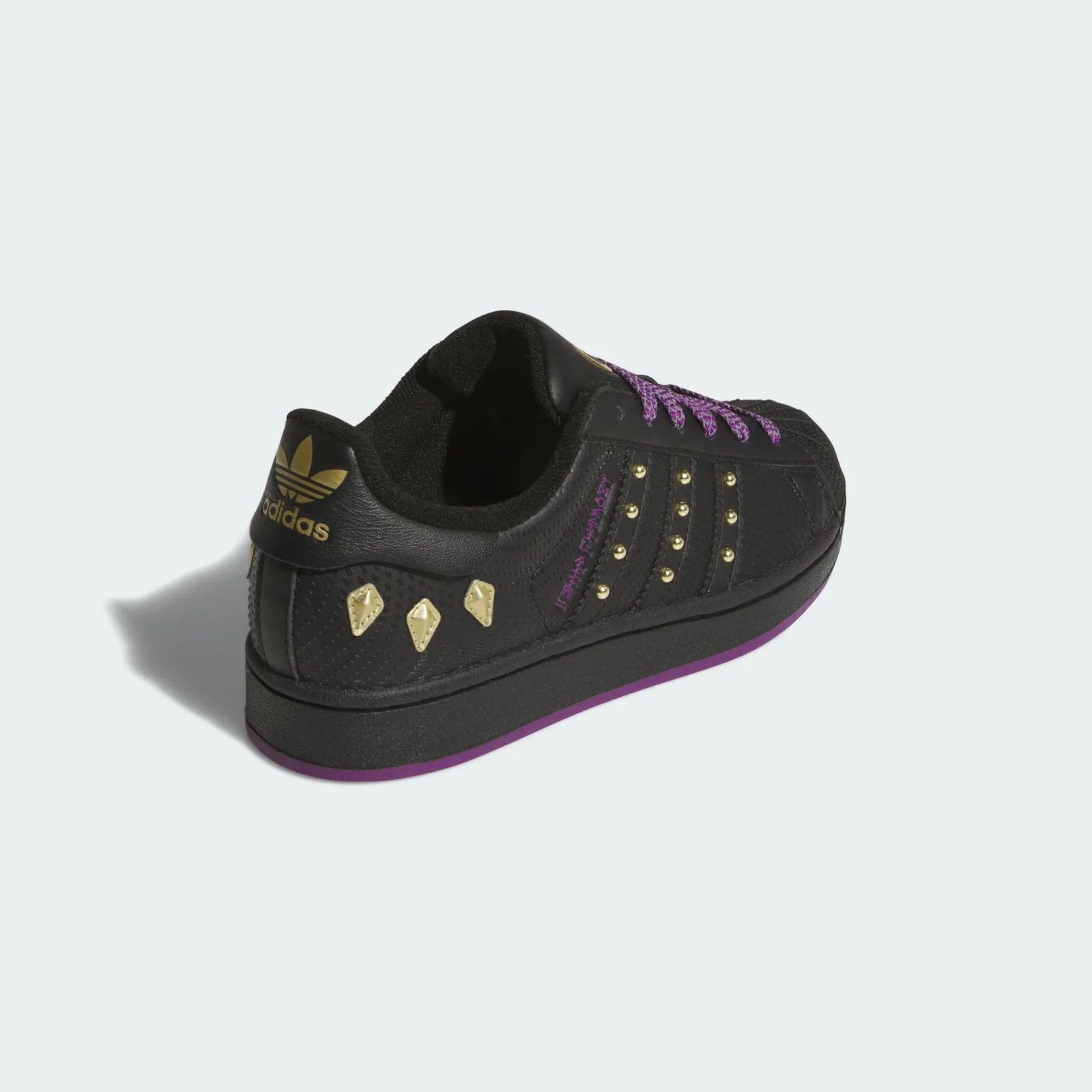 Rear three-quarter view with a gold adidas heel logo and gold claw-shaped accents, Black Panther