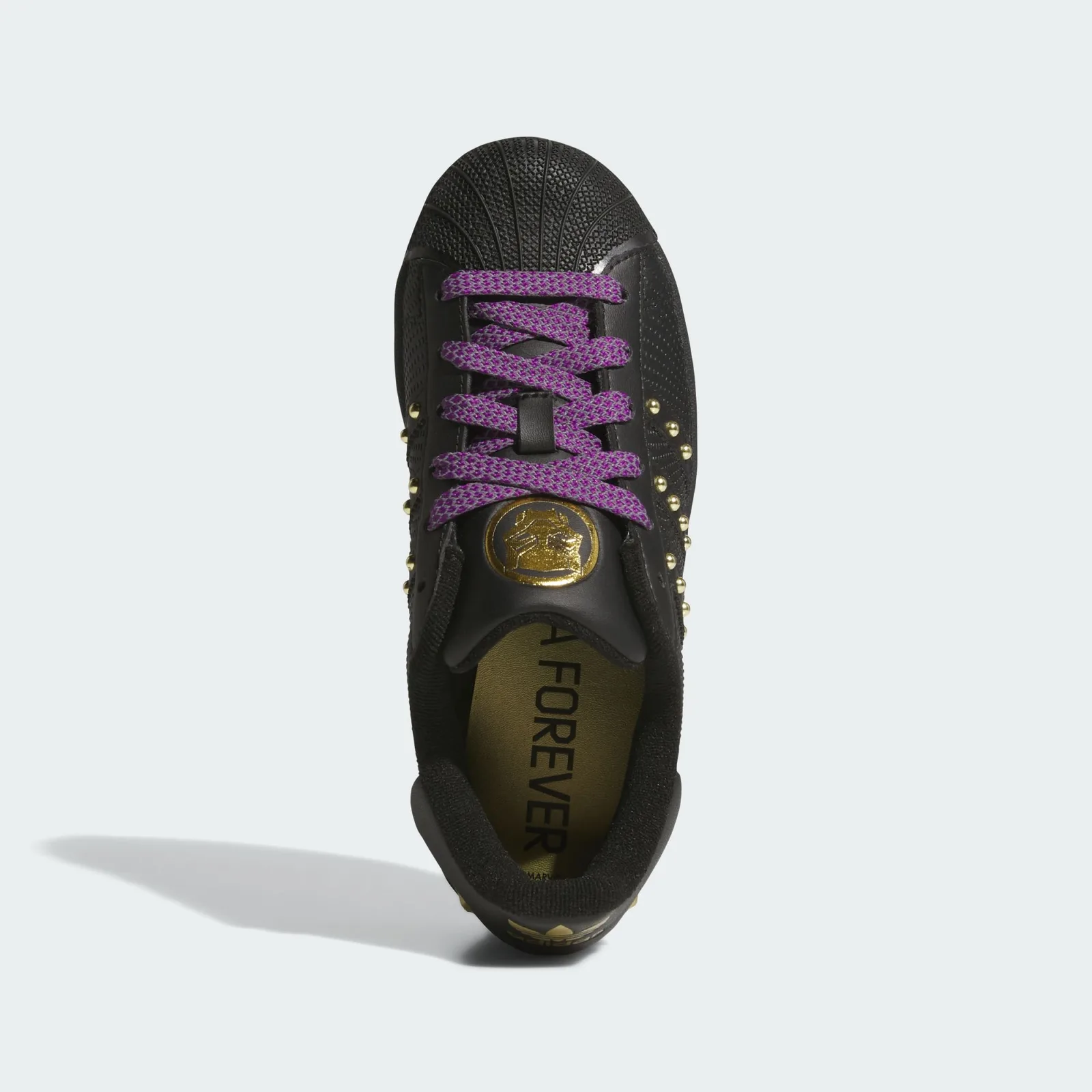 Top-down view with purple patterned laces and a gold Black Panther tongue logo, Black Panther