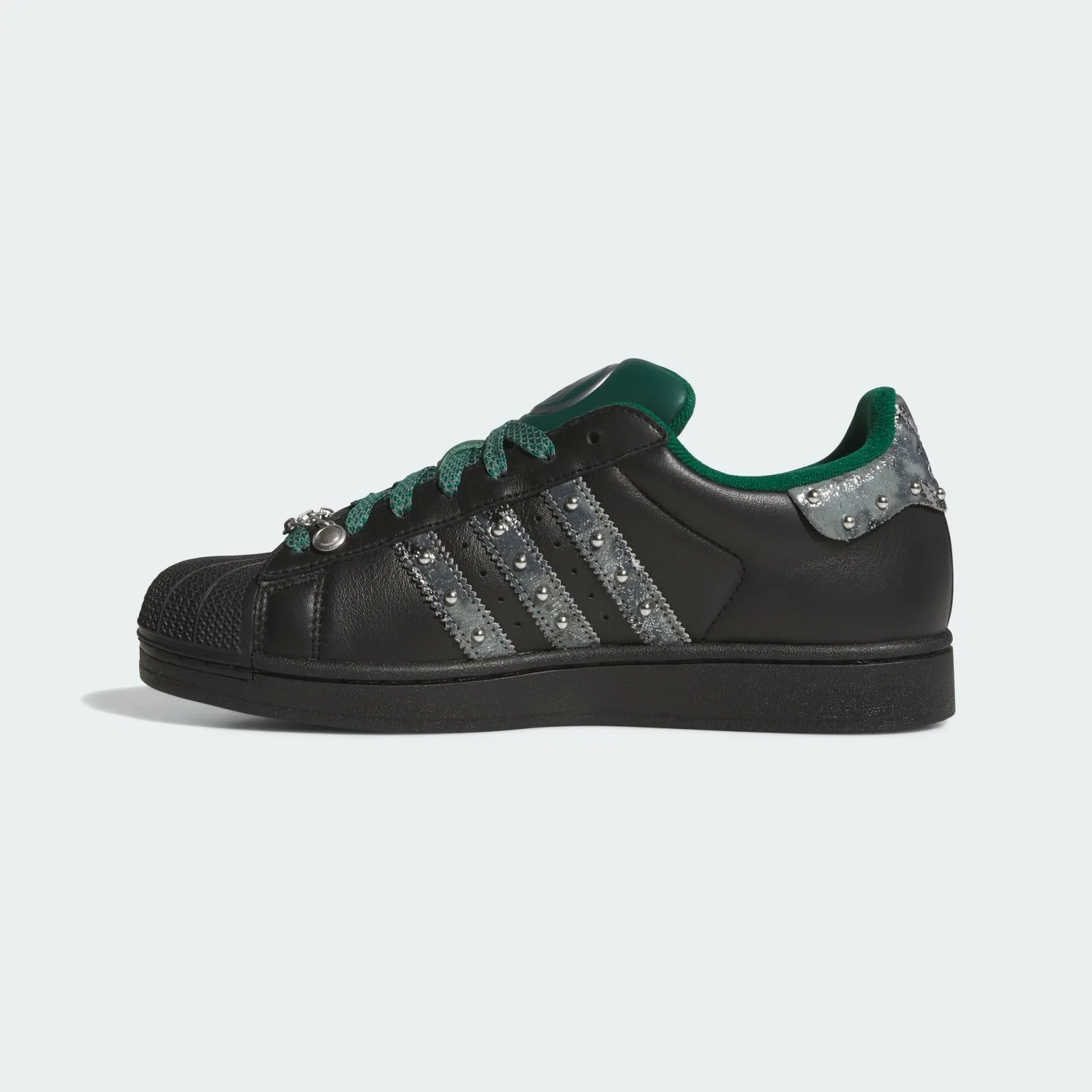 Medial view with studded silver stripes and a green collar, Doctor Doom