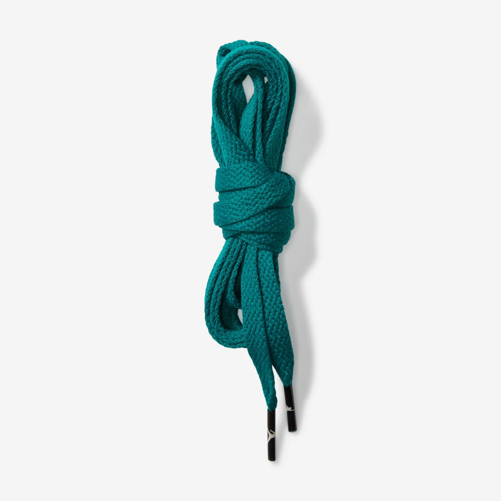 Detail of a coiled flat teal lace with black tips, Somos Historias