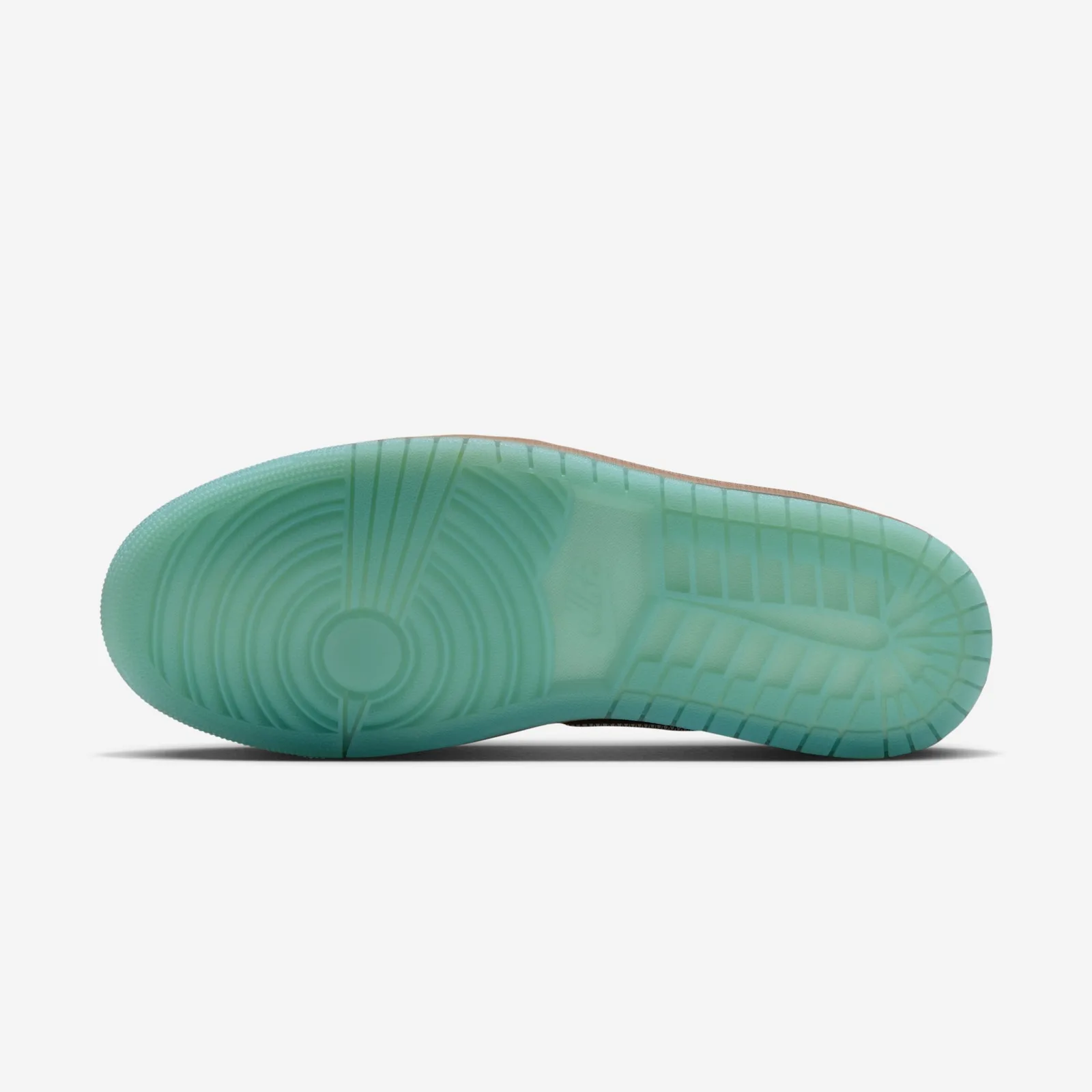 Outsole view, translucent teal rubber with circular pivot pattern and tread lines, Somos Historias