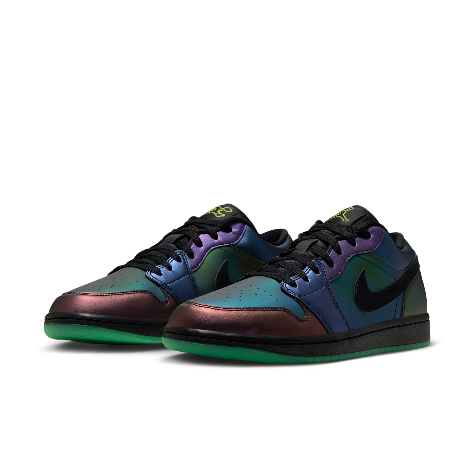 Pair at three-quarter angle, iridescent upper, black swoosh, neon green Jumpman on tongue, Air Bugs