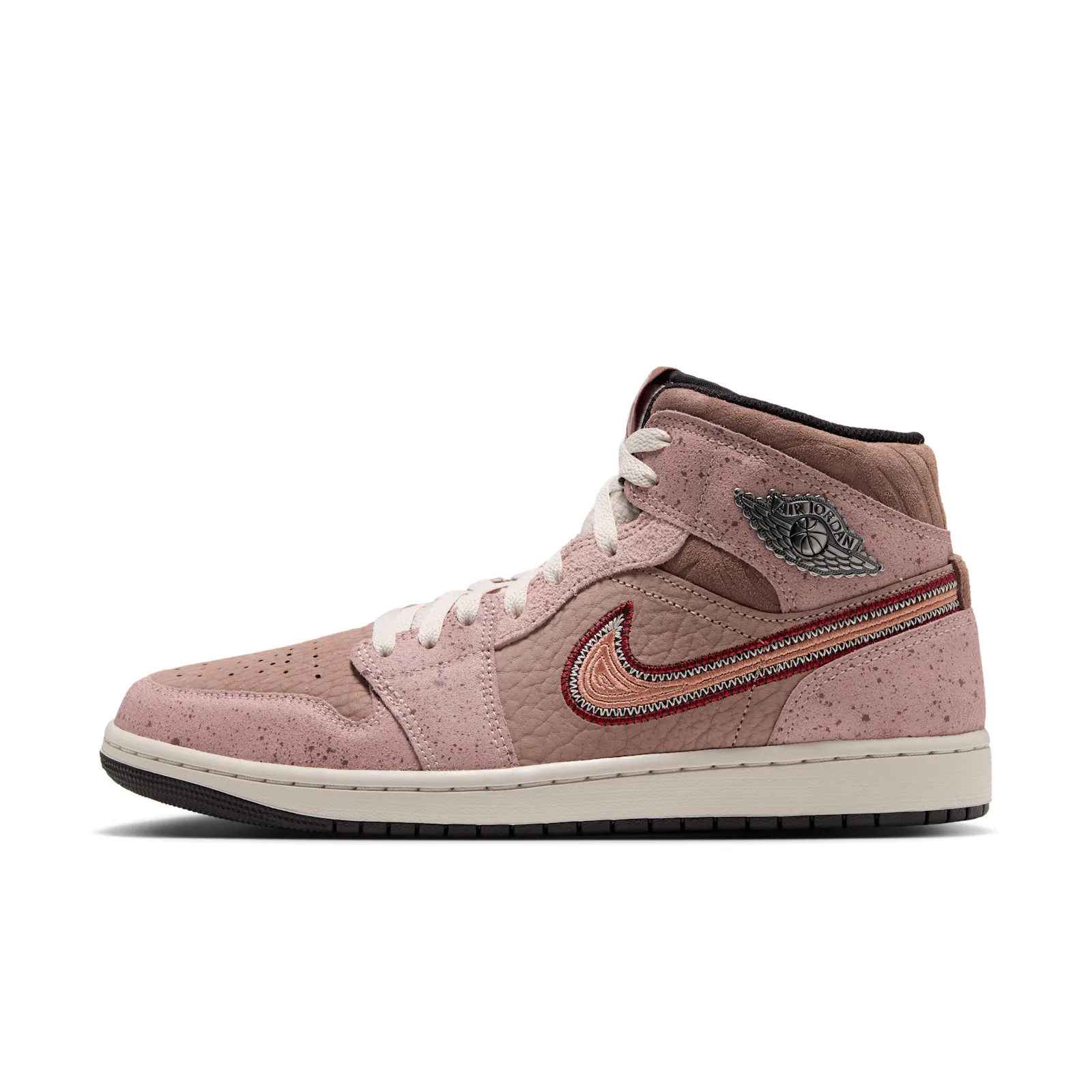 Lateral view on white, pink speckled suede and brown pebbled leather with red-stitched swoosh, Dia de Los Muertos