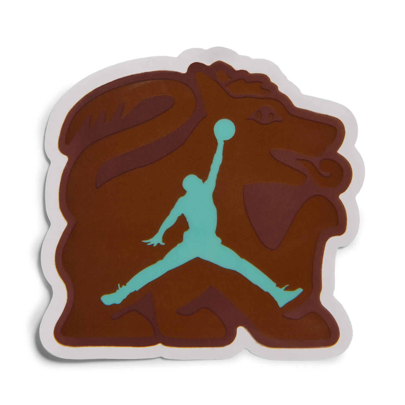 Detail of sticker with teal jumpman over a brown creature graphic, white border, Dia de Los Muertos