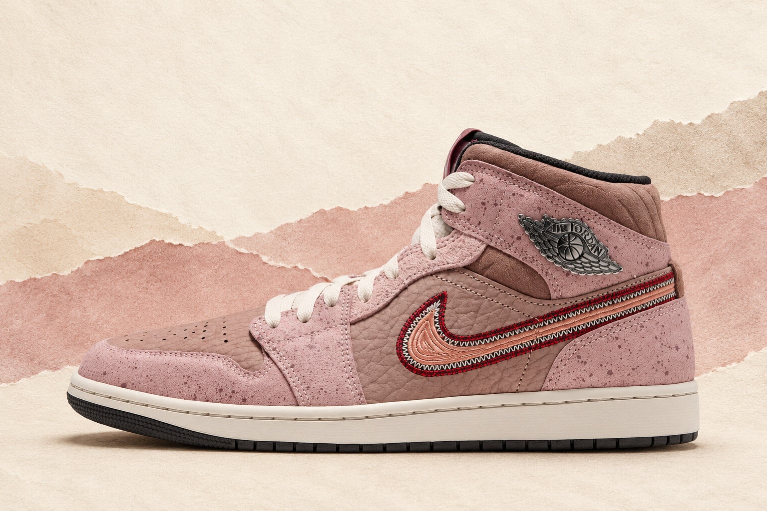 Lateral view on torn-paper backdrop, pink speckled suede, embroidered swoosh, silver, Air Jordan 1 Mid “Dia de Los Muertos”