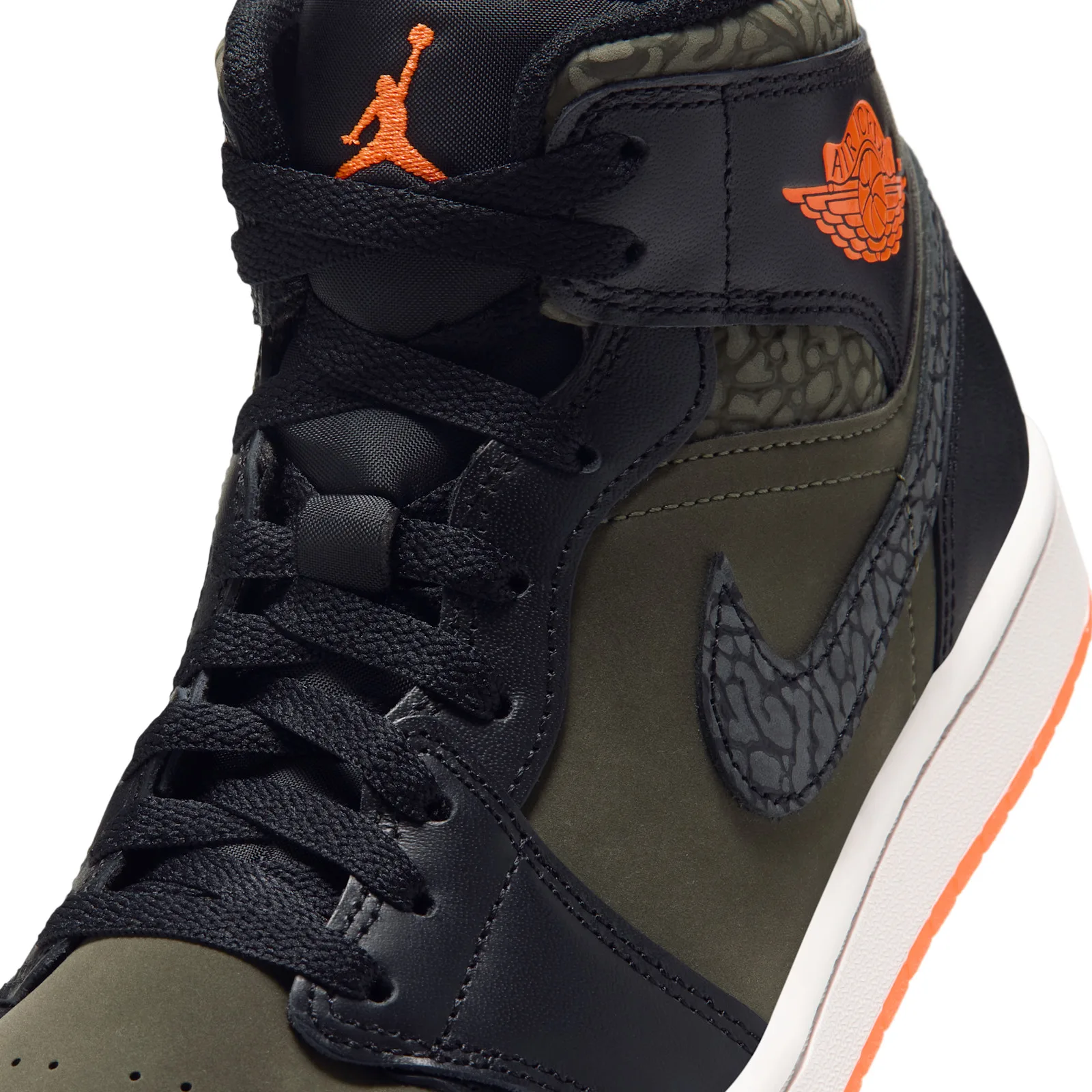 Detail of laces and tongue, orange Jumpman, elephant-print swoosh, olive nubuck, Flight Jacket