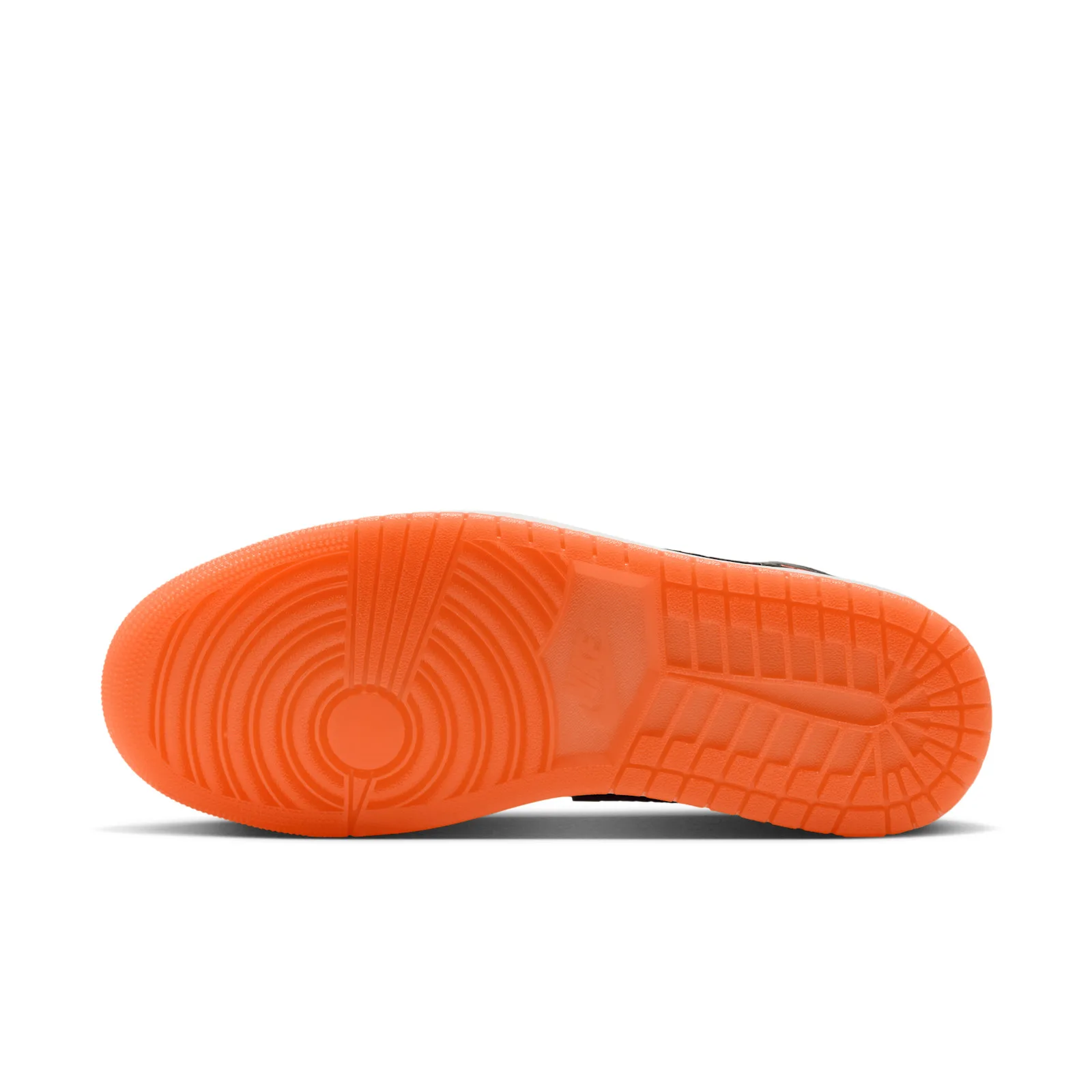 Outsole view, bright orange rubber with concentric circle and herringbone tread, Flight Jacket
