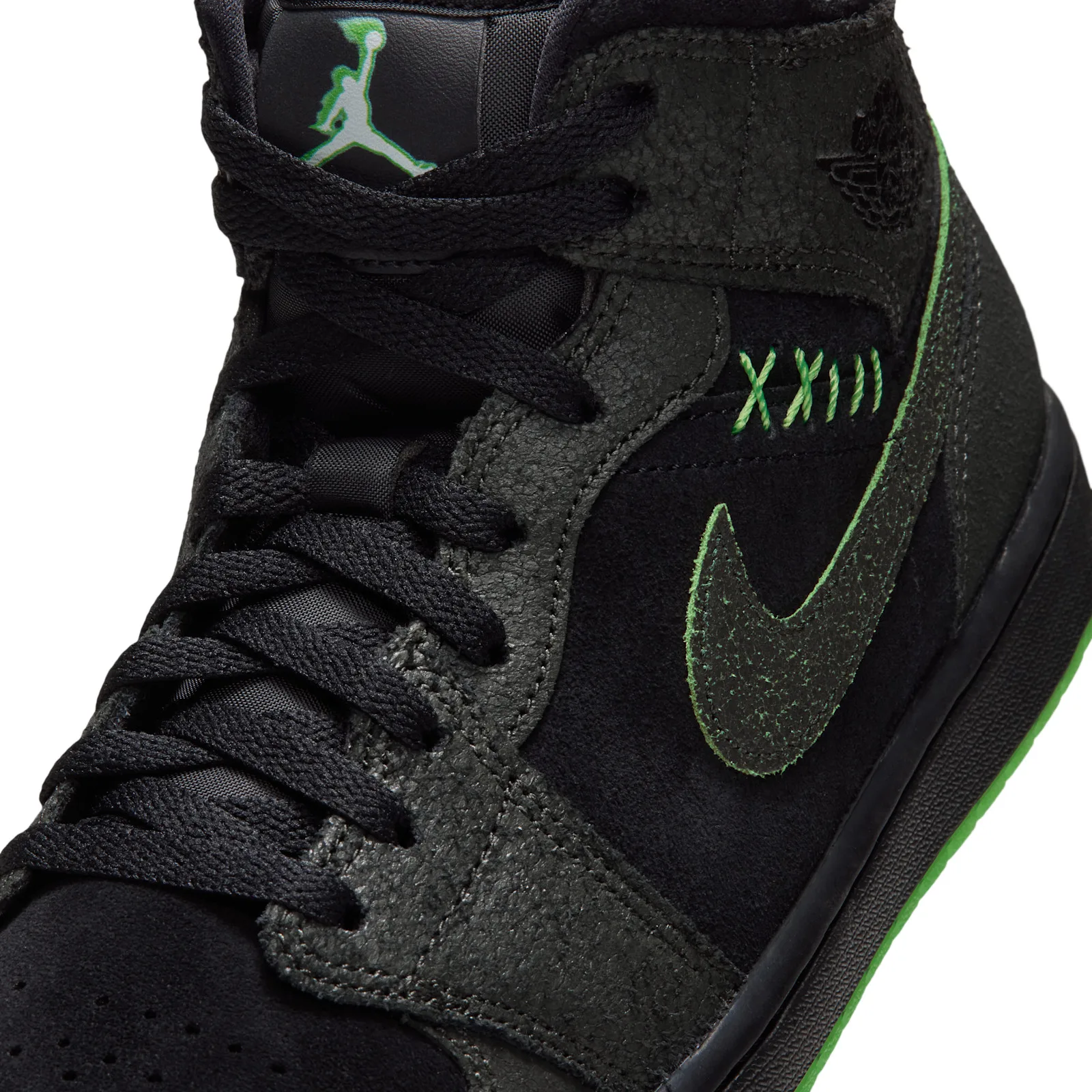 Lateral detail with green XXIII stitching and a green-edged dark Swoosh, Halloween