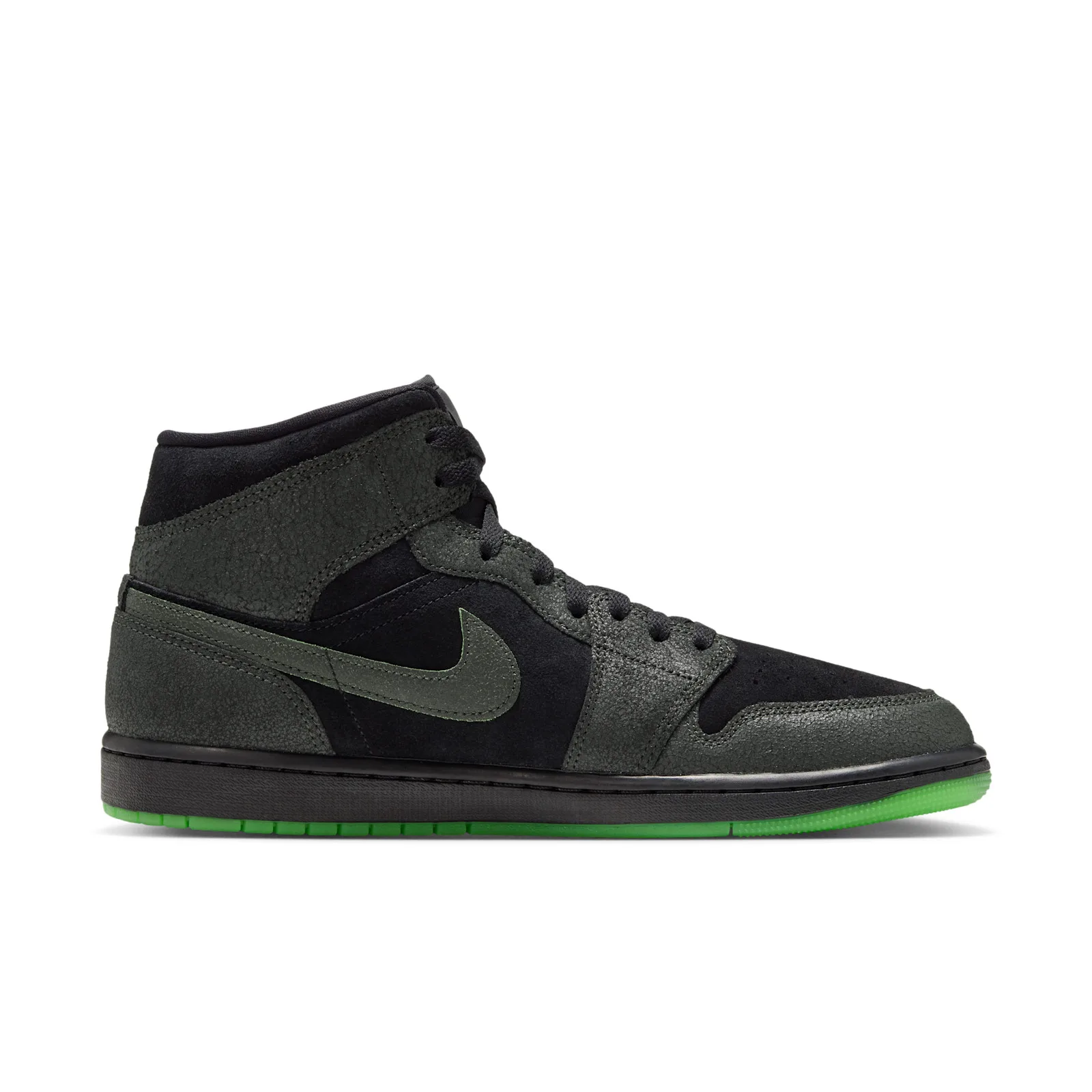 Medial view with a dark grey Swoosh and green outsole, Halloween