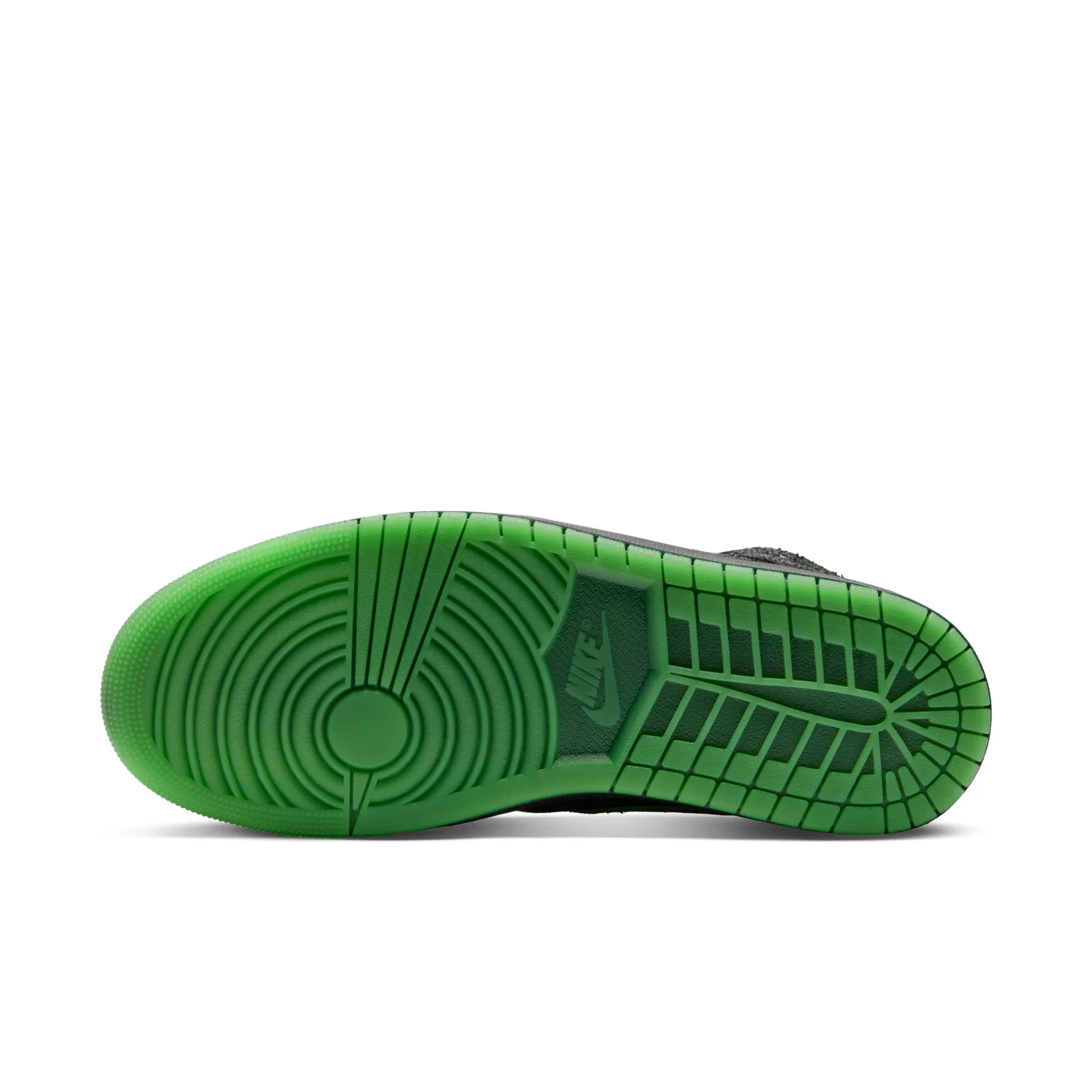 Green outsole with circular forefoot tread and a Nike logo, Halloween