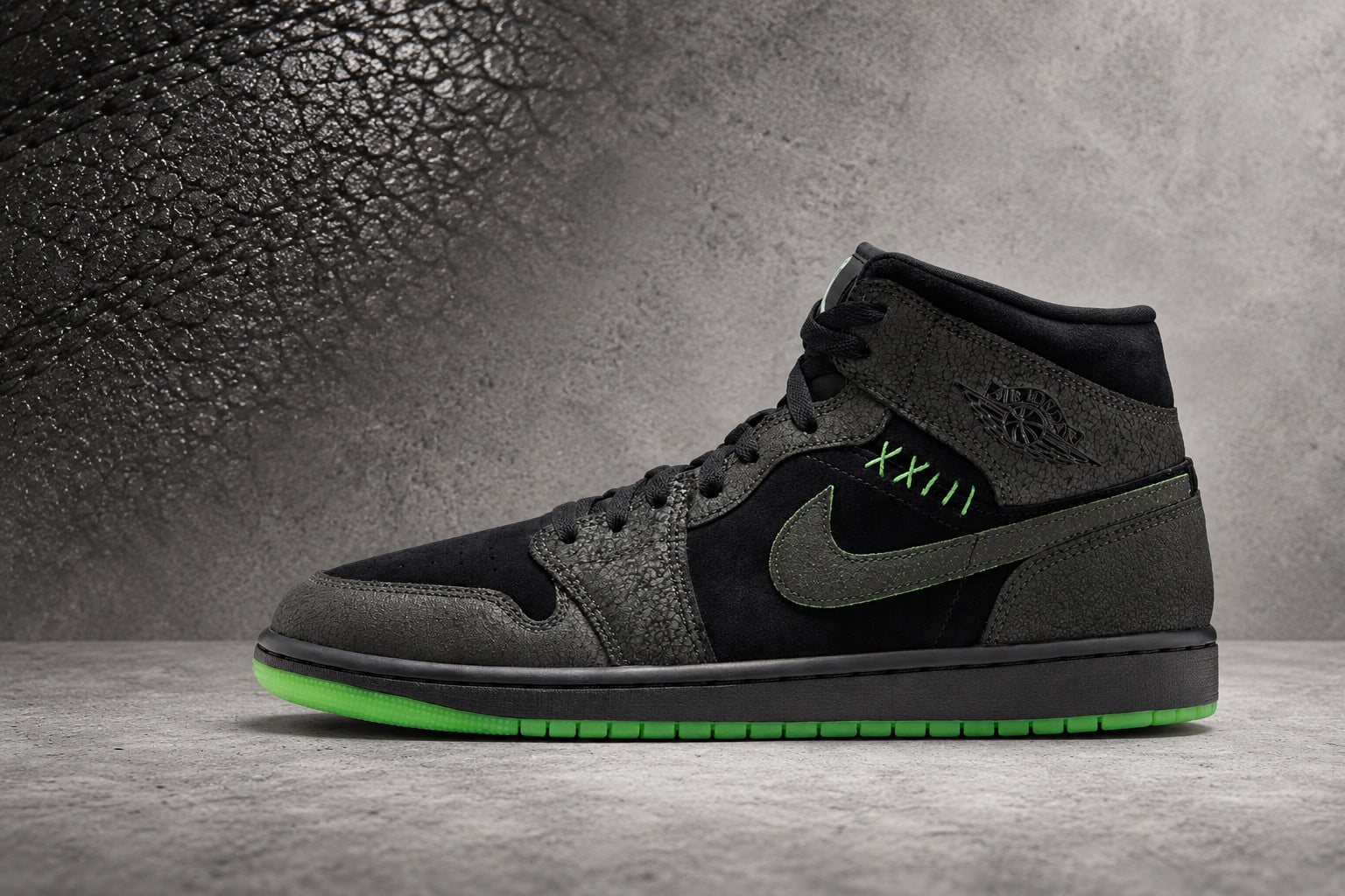 Lateral view with cracked dark overlays and a green outsole on grey concrete, Air Jordan 1 Mid “Halloween”