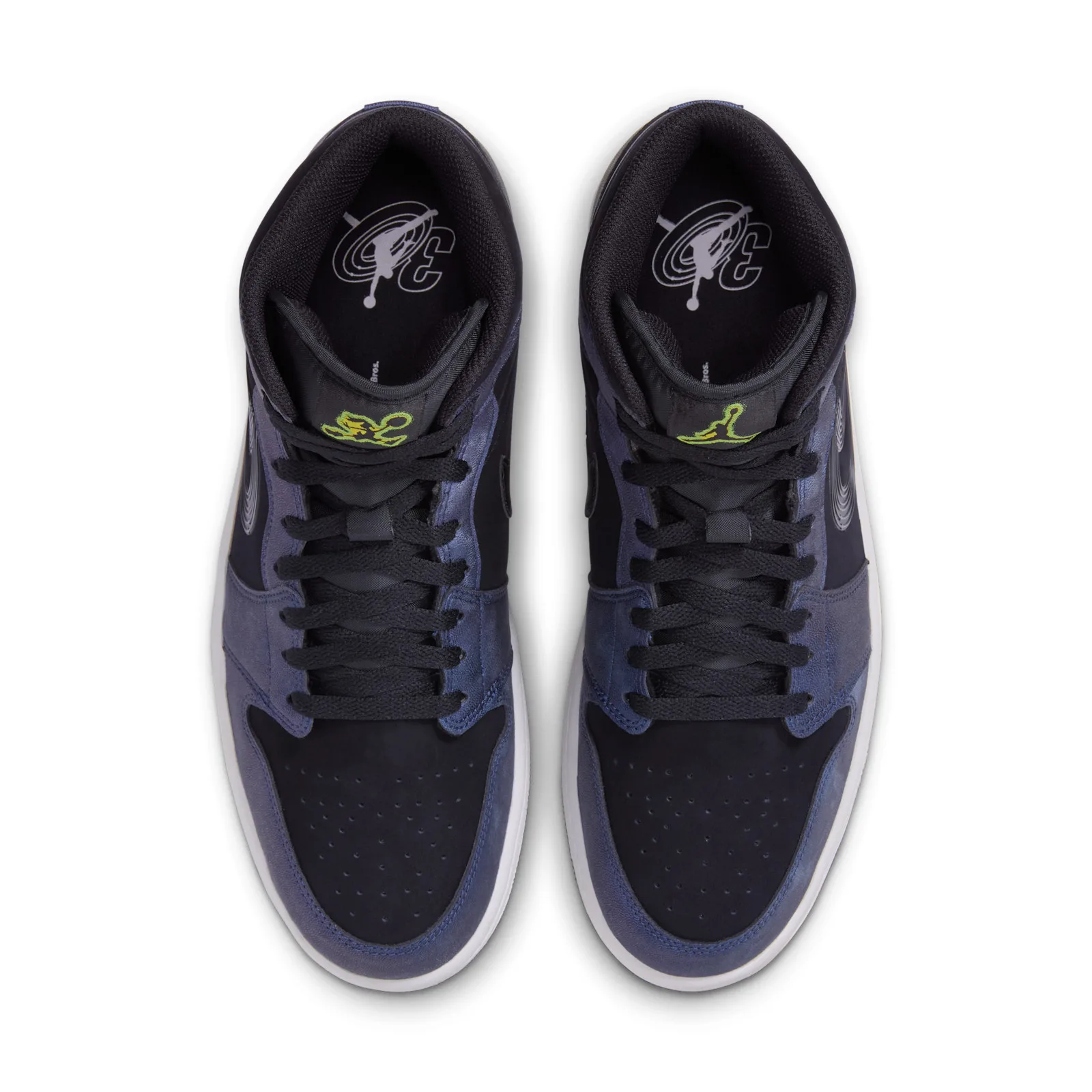 Top-down view of pair, black laces, green jumpman on tongue, 30 logo on insoles, Air Bugs