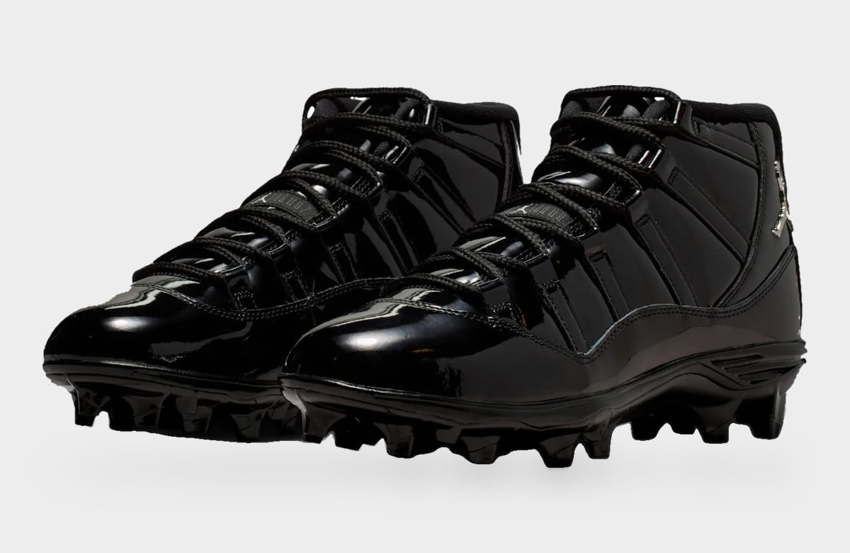 Pair at three-quarter angle, glossy black patent toe caps, black laces and black studded outsoles, Gammas
