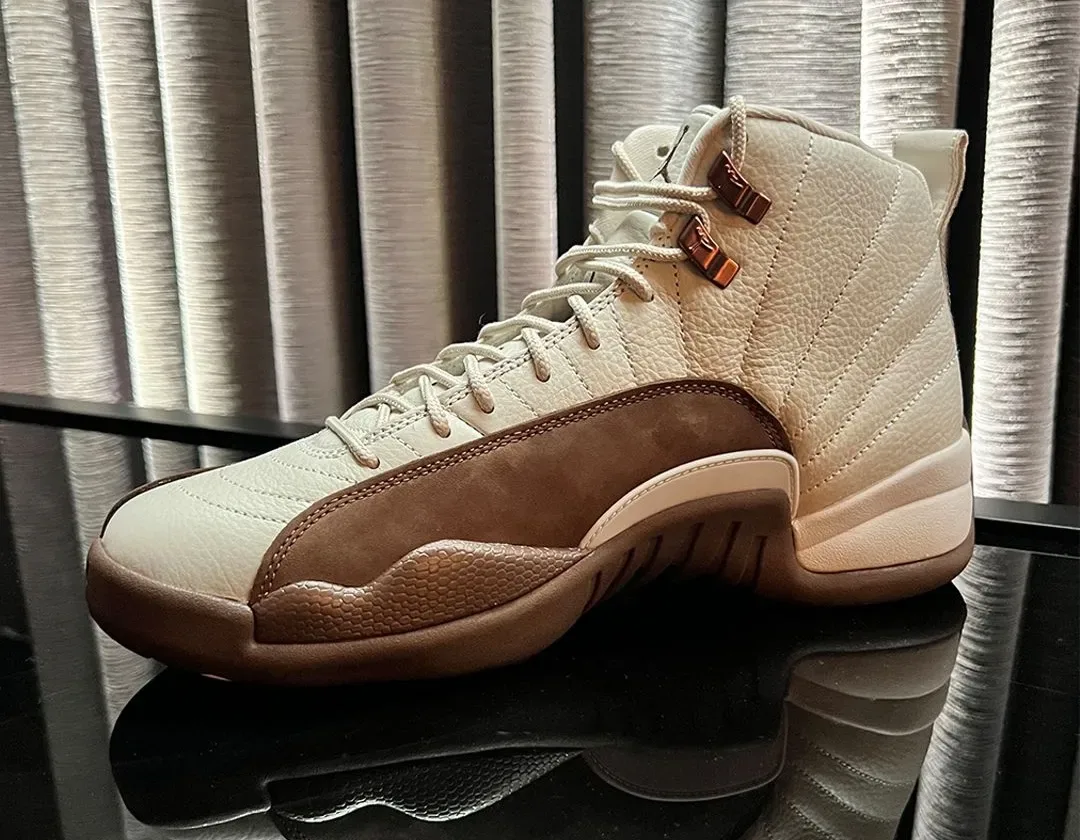 low-angle lateral view showing toe box, brown suede mudguard and cream midsole, Fireside