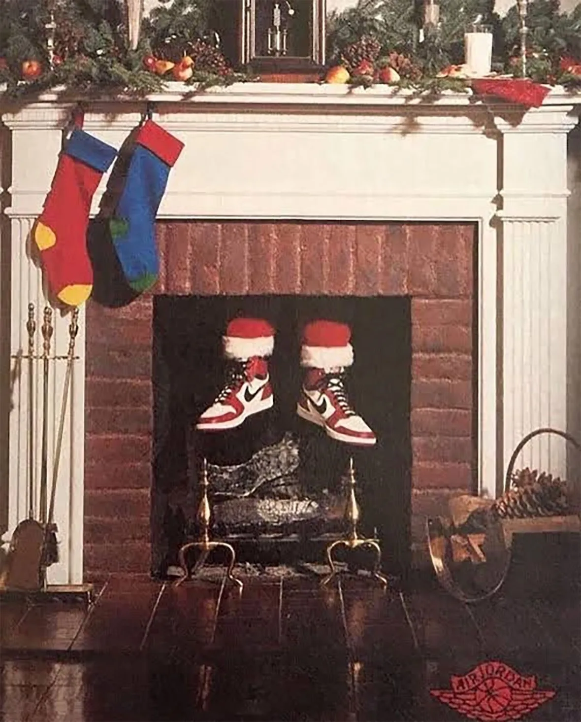 Vintage-style ad of two sneakers with Santa hat cuffs in a fireplace, stockings, Air Jordan wings logo, Santa