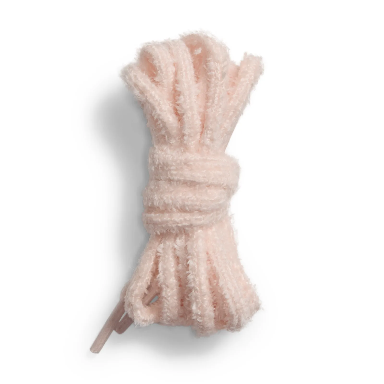 Bundle of fluffy pale pink chenille-style laces tied in a coil on white background, Lola Bunny