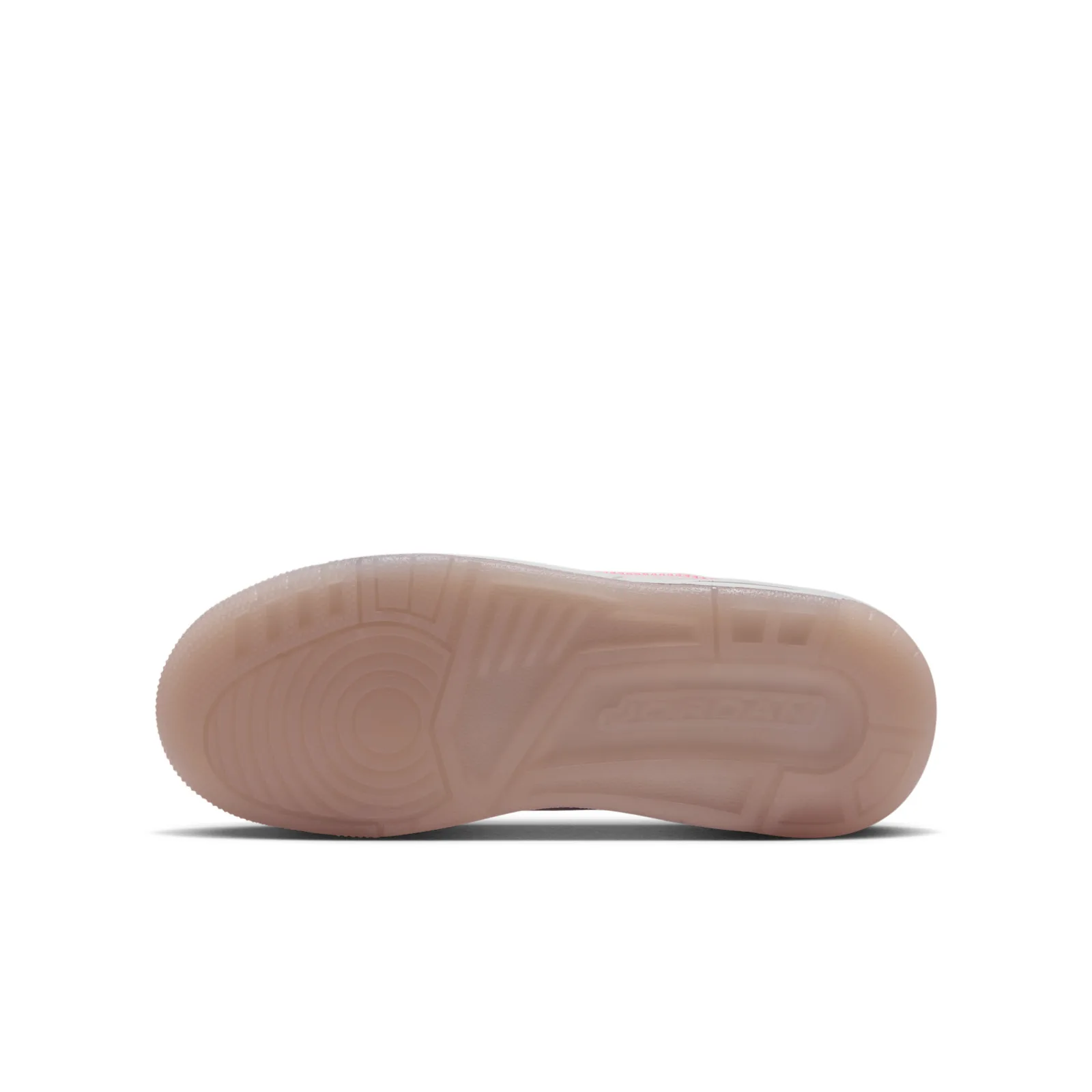 Outsole view of translucent blush-pink rubber sole with circular pivot pattern and tread blocks, Lola Bunny
