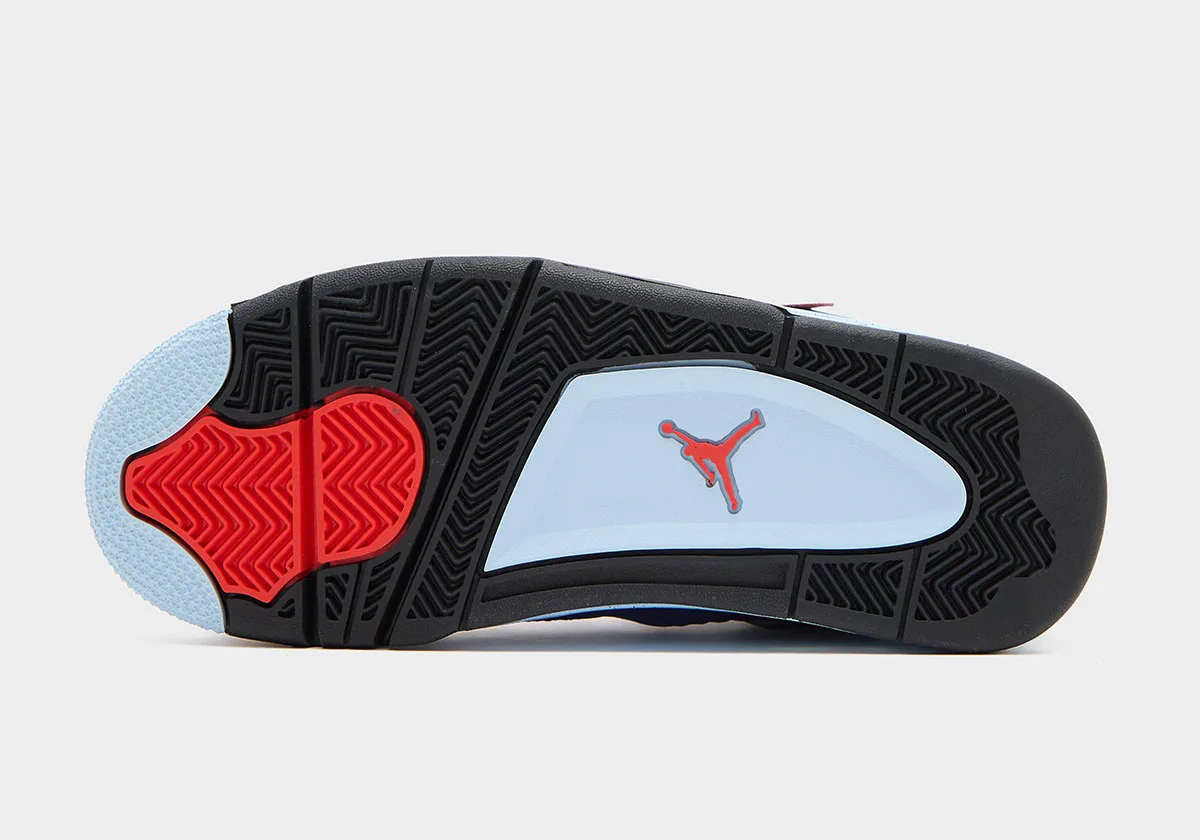 Outsole view in black with red heel pod and light blue Jumpman panel, Deep Royal Blue