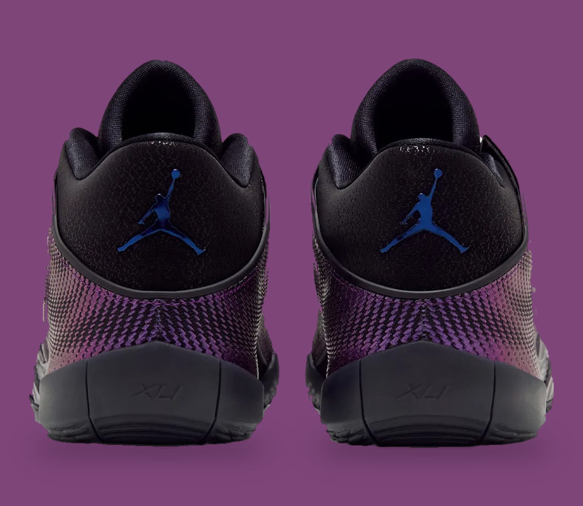 Heel view of pair, blue Jumpman logos on black heel tabs, XLI on midsole, Amethyst