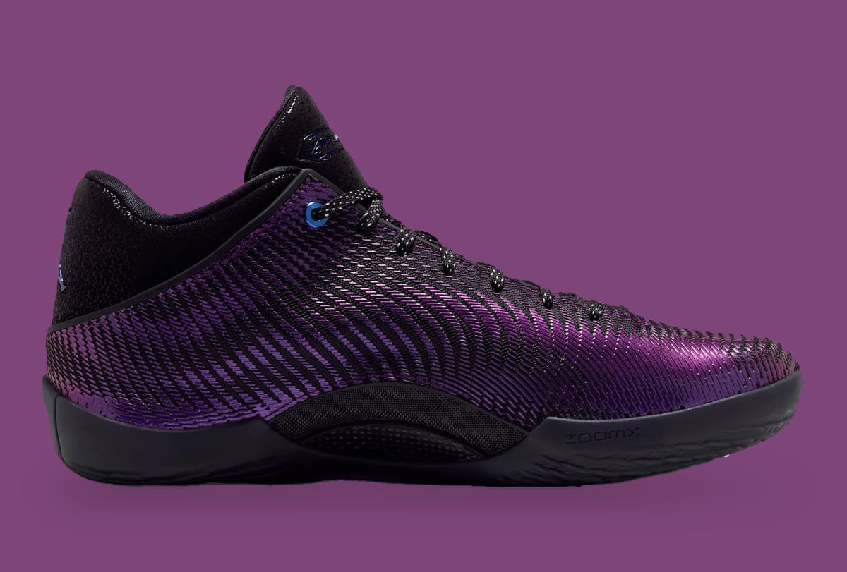 Medial view, purple woven upper, black sole with ZoomX text, blue eyelet, Amethyst