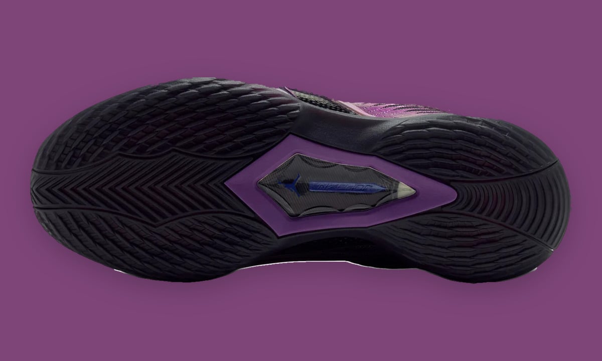 Outsole view, black herringbone tread, purple clear heel window with blue text, Amethyst