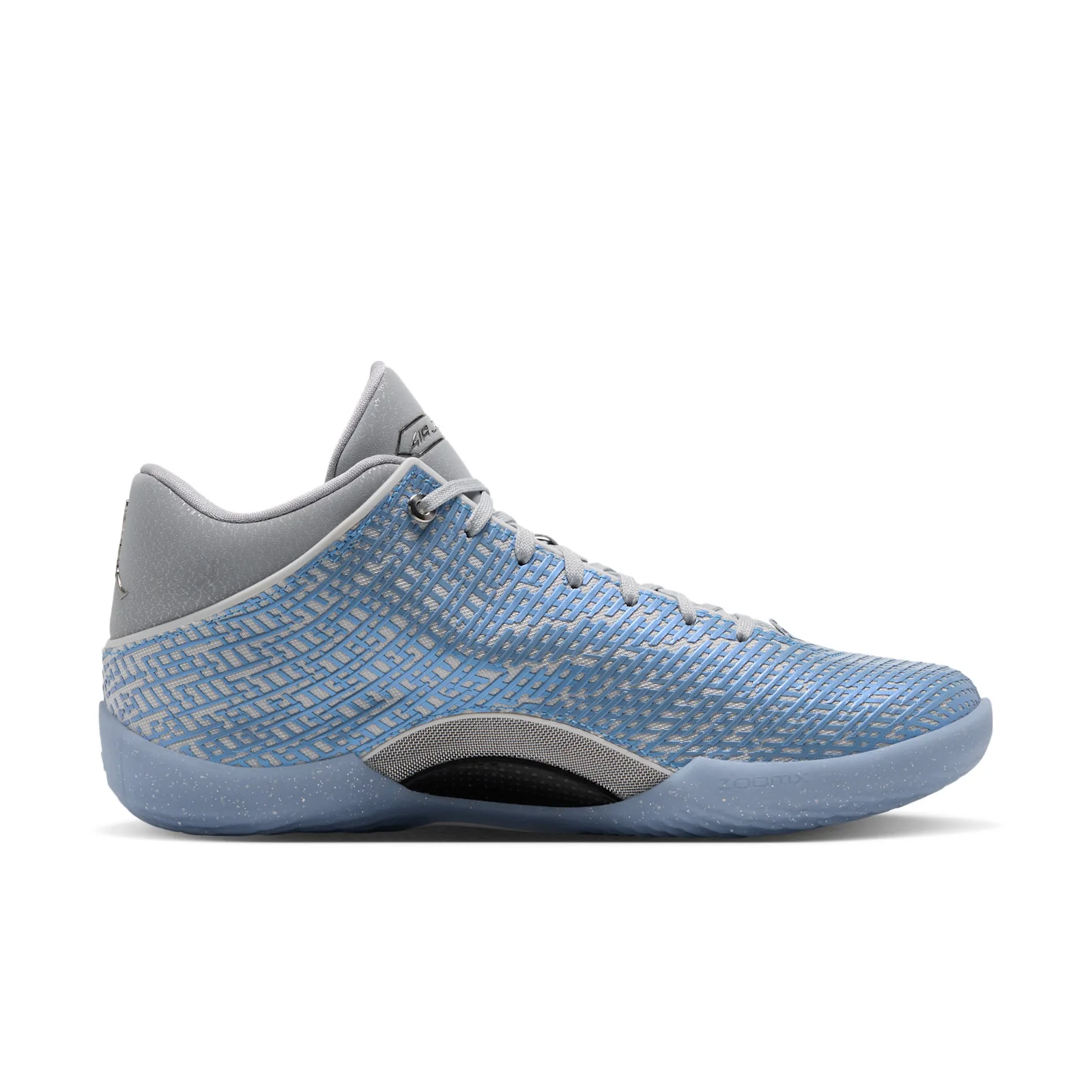 Lateral view of light blue maze-patterned upper, grey heel counter, translucent speckled midsole, Space Jam