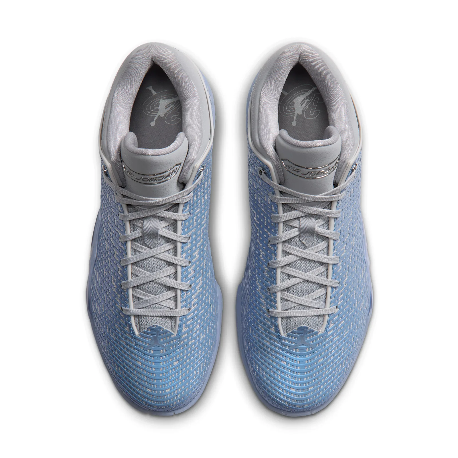 Top-down view of the pair with grey laces, grey collar and light blue woven upper, Space Jam