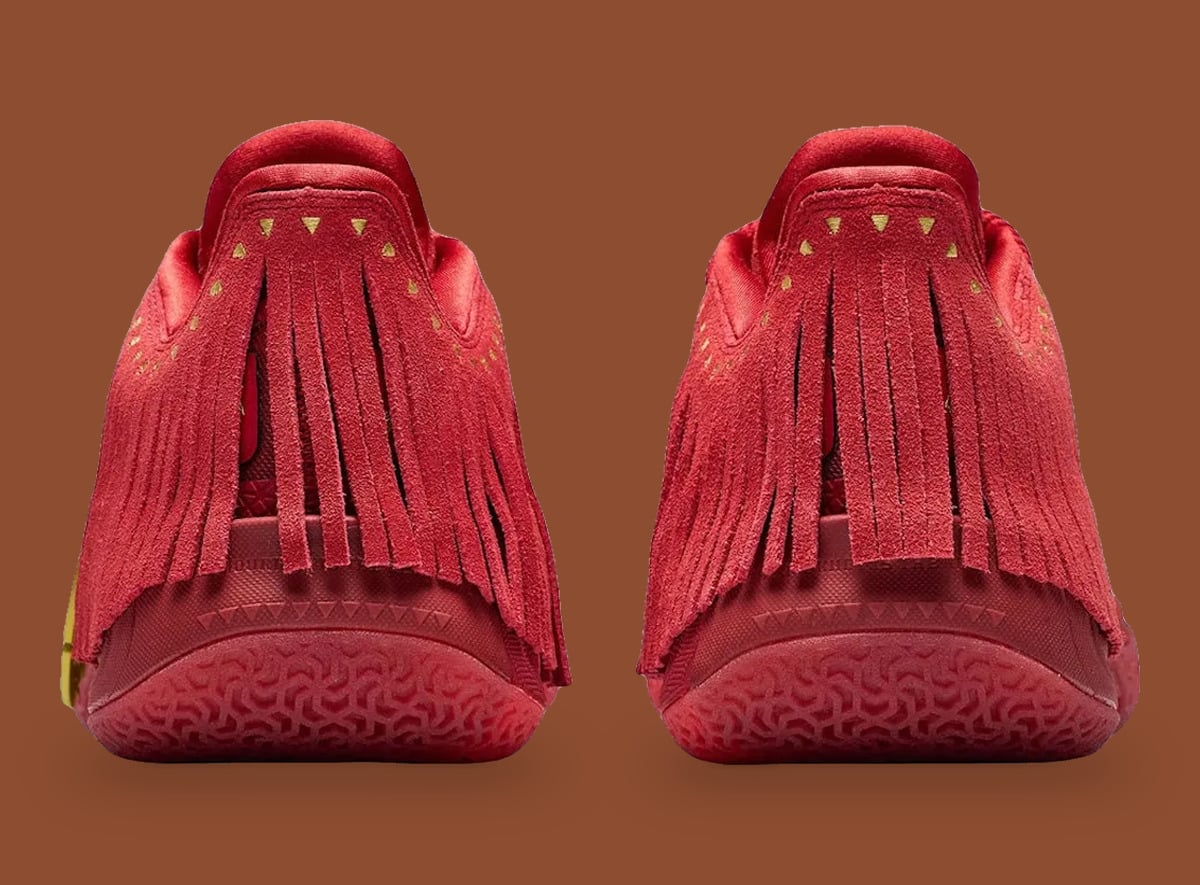 Heel view of pair, red suede fringe with gold triangle studs on brown, Red