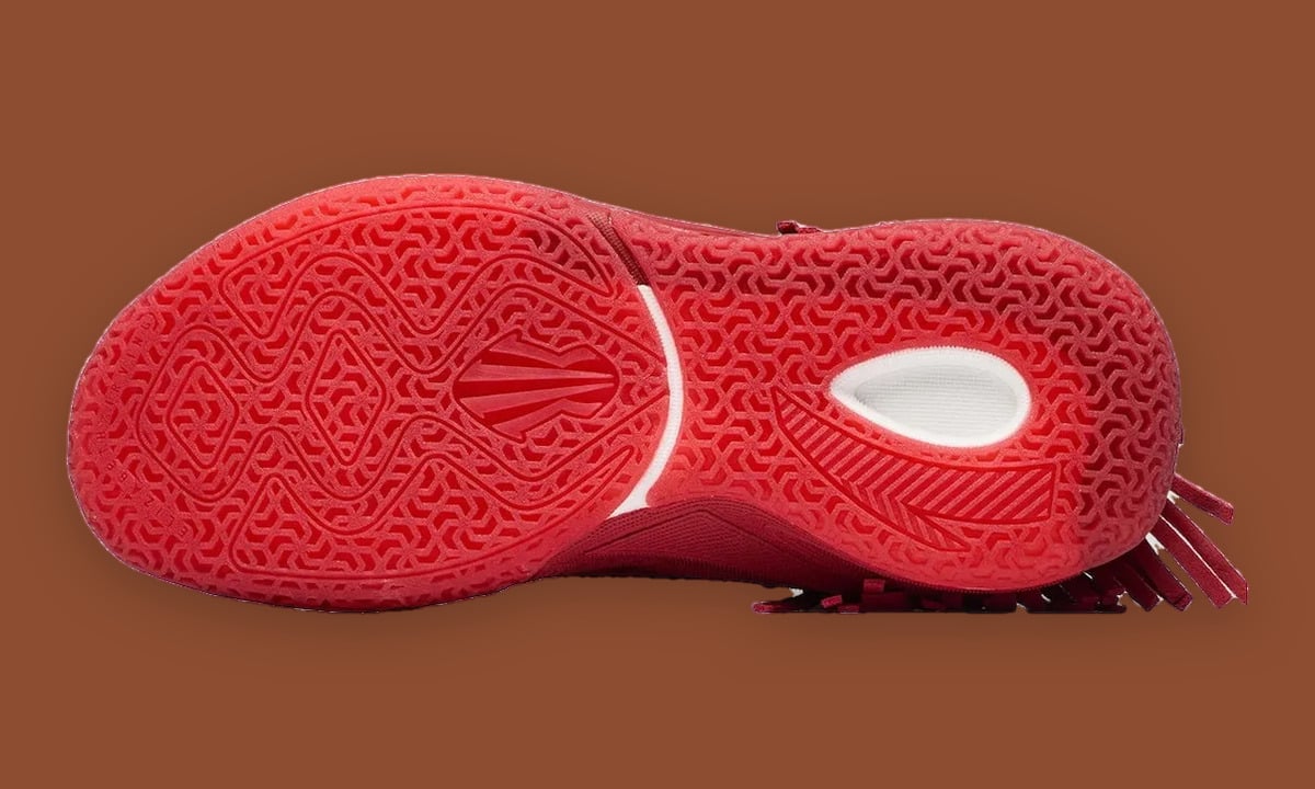 Outsole view, red patterned tread with white heel cutout and fringe at edge, Red