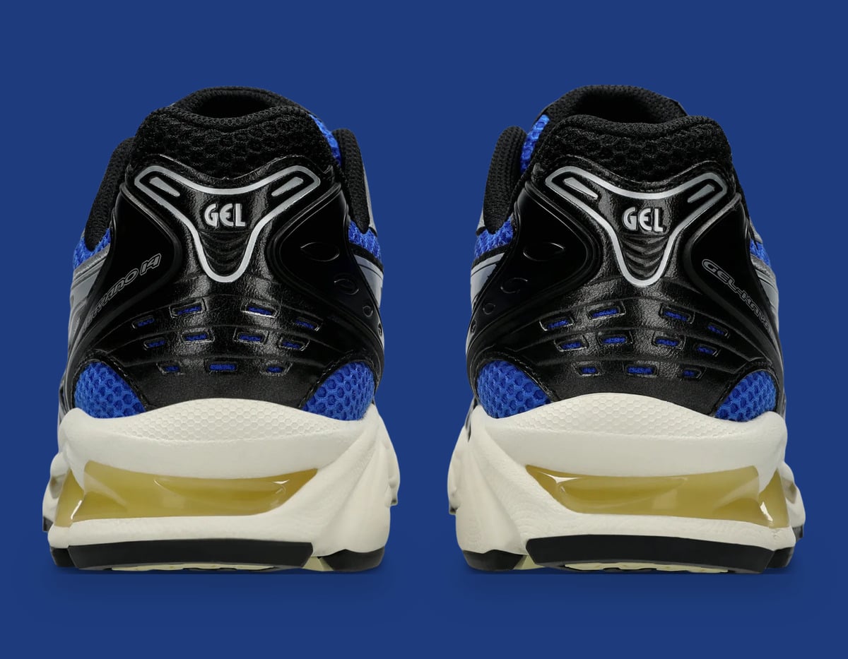 Heel view of the pair, black heel clip with GEL text and yellow midsole inserts, Illusion Blue