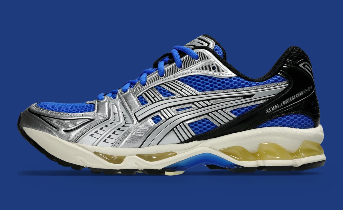 Medial view with silver stripes, black heel counter and blue mesh on blue backdrop, Illusion Blue