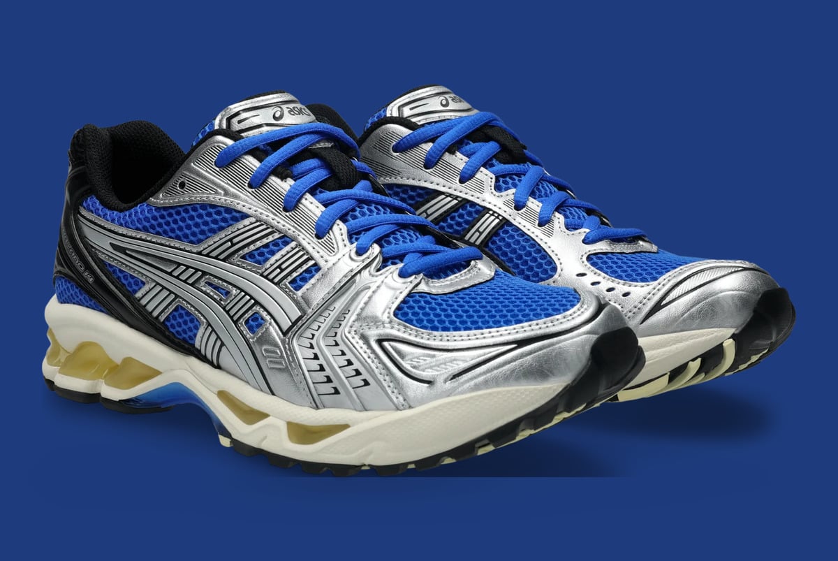Pair, three-quarter view on royal blue backdrop, silver panels and cream midsole, Illusion Blue