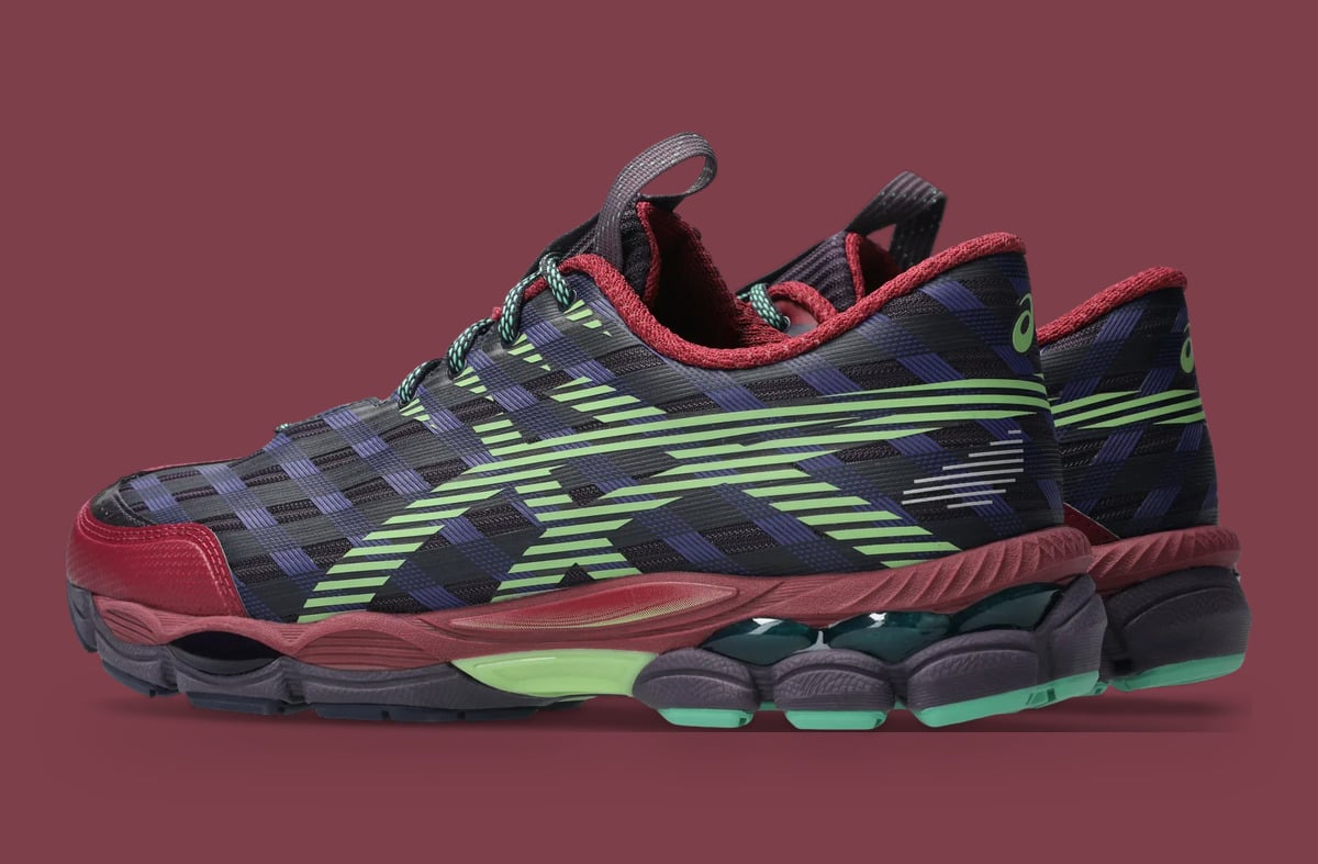 Rear three-quarter pair, navy upper with lime stripes and green logo on heel, x Kiko Kostadinov