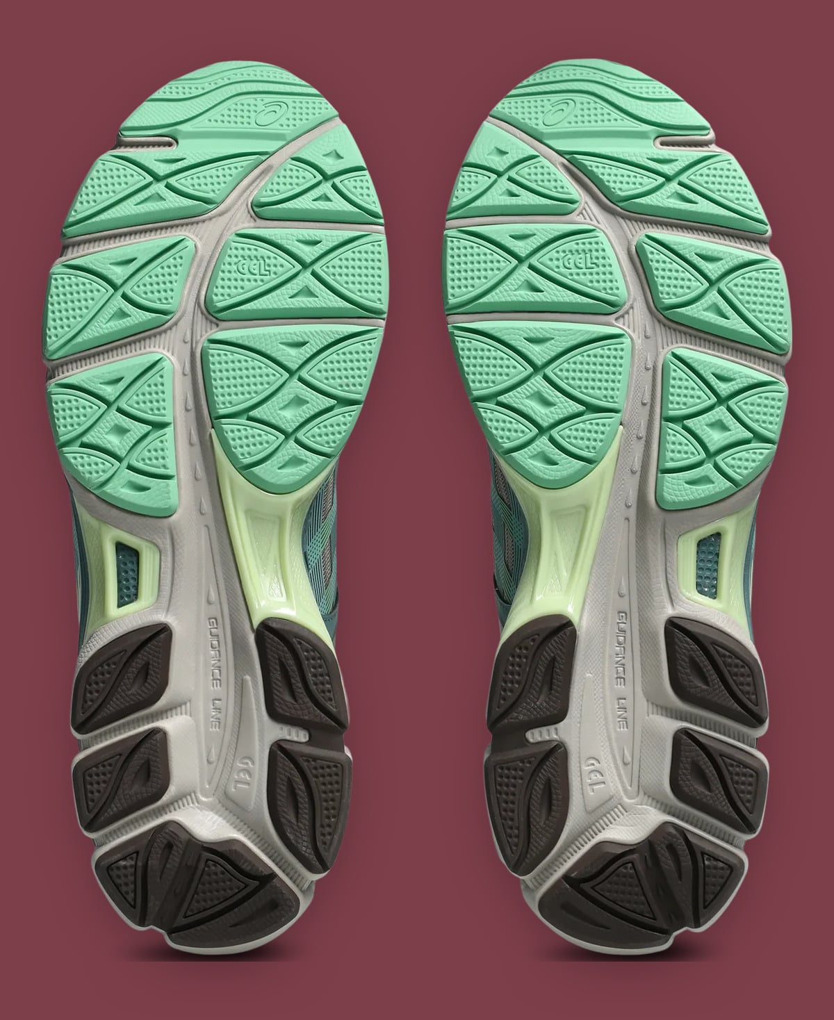 Outsole pair, mint forefoot tread, grey midfoot and brown heel pads, GEL text, x Kiko Kostadinov