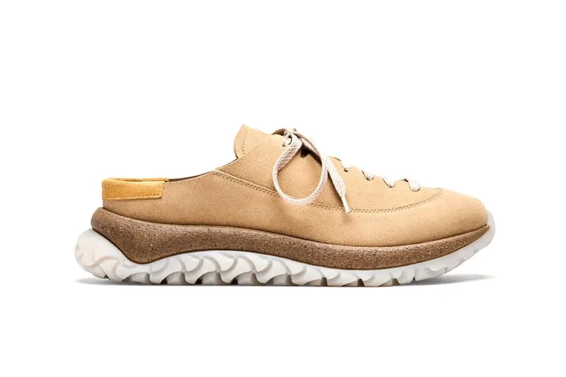 Medial view of a tan suede lace-up mule with mustard heel tab, cork midsole and white sole, Birkenstock 1774 Uerzell