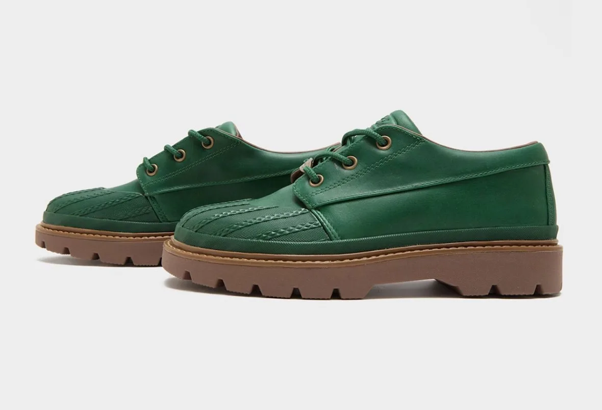 Green pair side by side, lateral view, ribbed toe caps, gum soles, brass eyelets, Bronco Boot Low