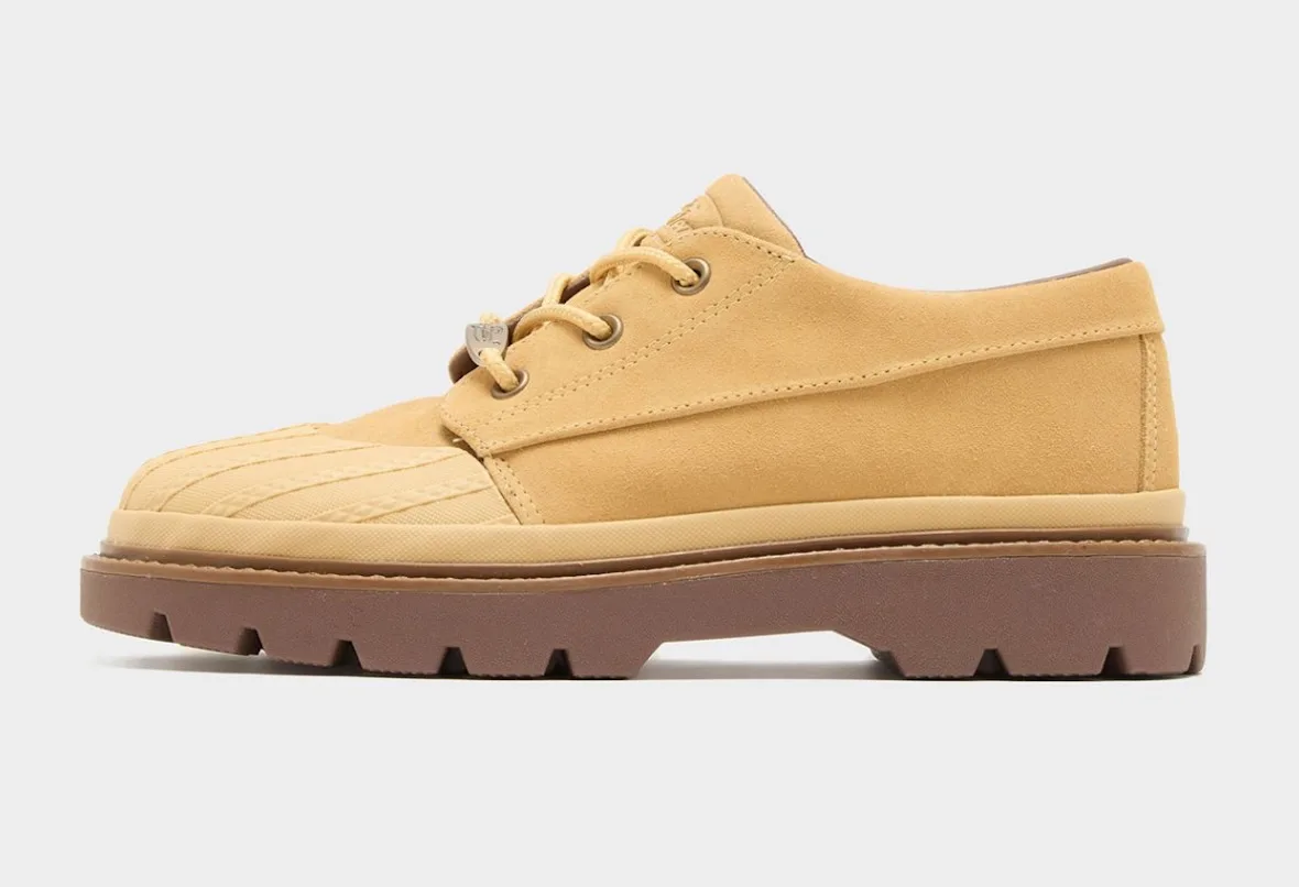 Lateral view of tan suede shoe, ribbed toe cap, brass eyelets, brown lugged sole, Bronco Boot Low