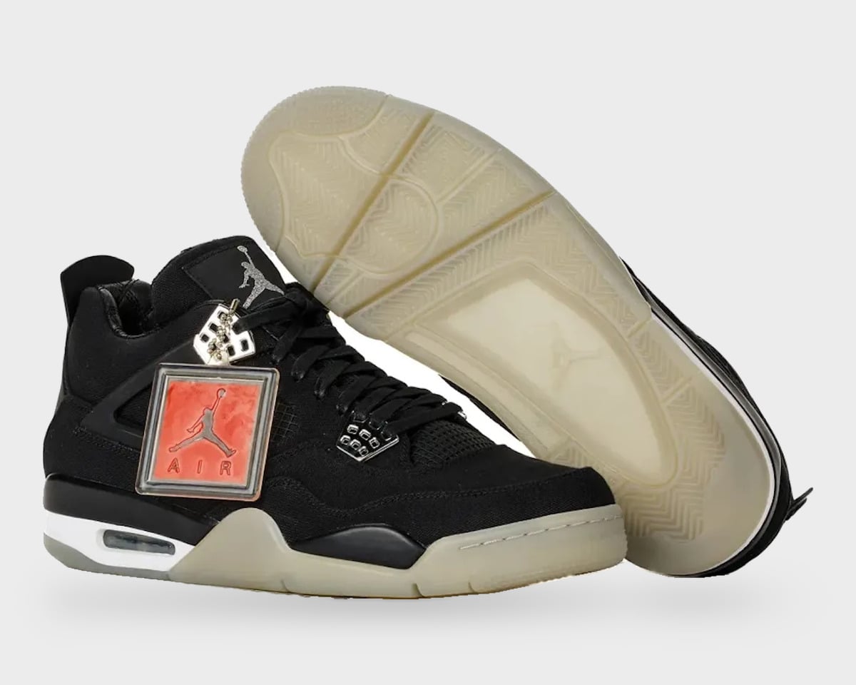 Pair, lateral and outsole; black canvas, translucent sole, silver Jumpman and red AIR tag, StockX LISTED Collection