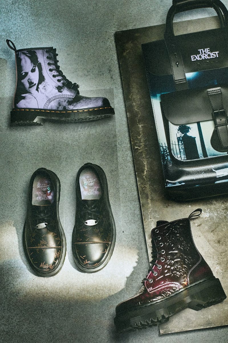 Flat lay of printed boot, two black shoes with scribbles, burgundy boot and a bag with film title, The Exorcist