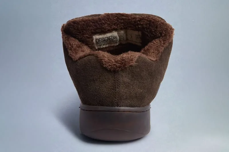 Heel view showing brown fleece collar and a woven label inside the shoe, Chocolate Brown
