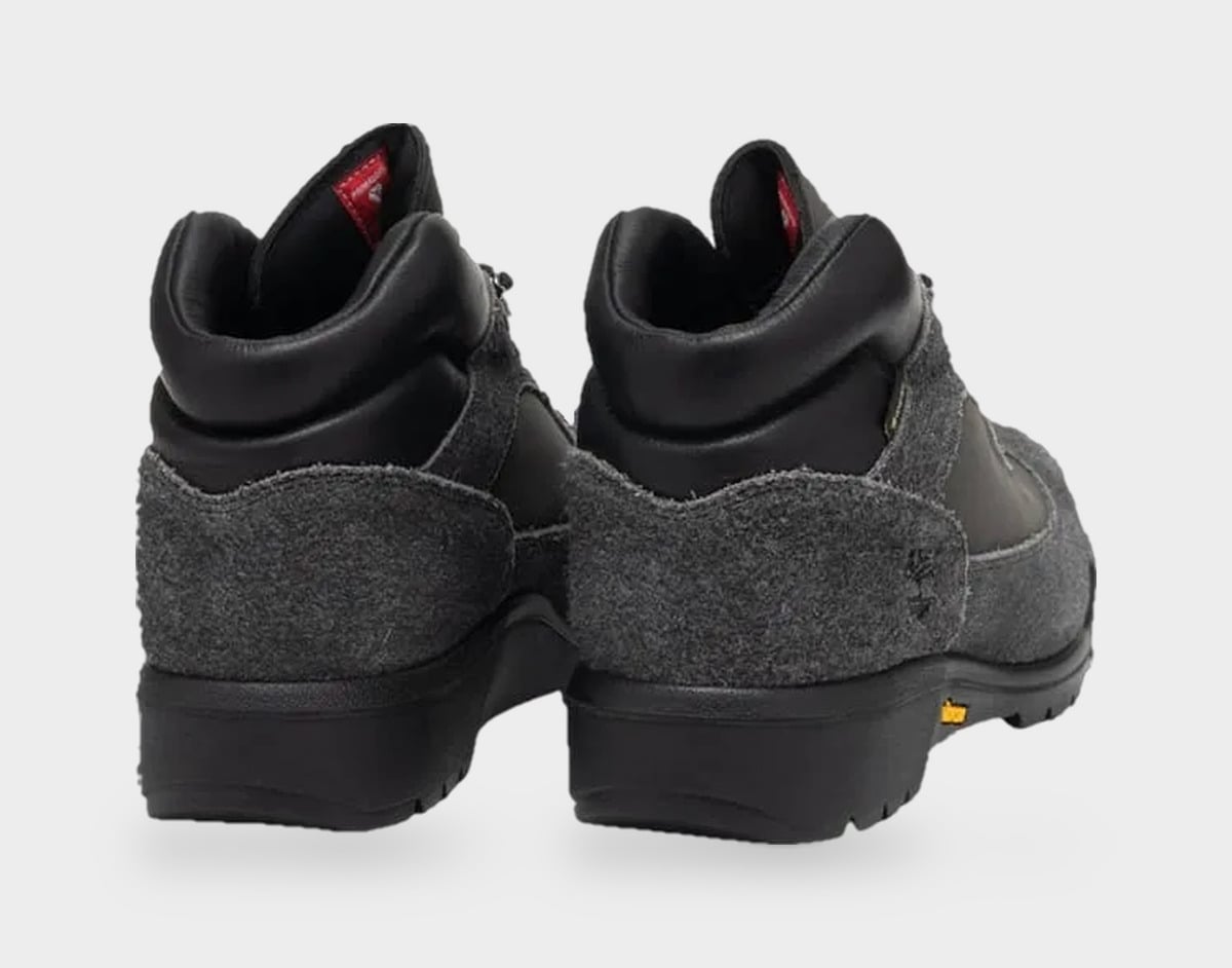 Pair from the heel, grey suede heel panels, black padded collars, red inner tag, Black