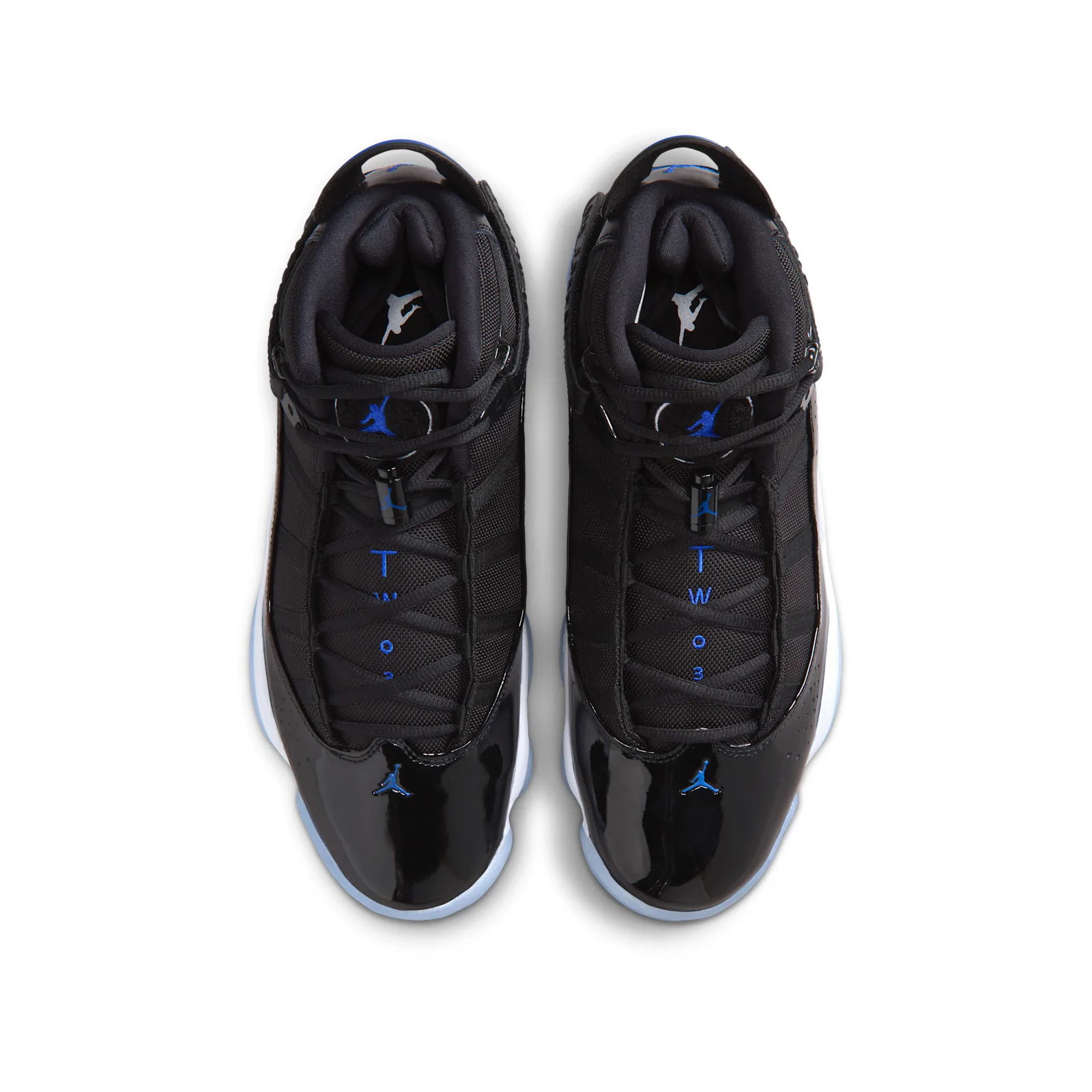 Top-down pair with black mesh uppers and blue Jumpman logos, Space Jam