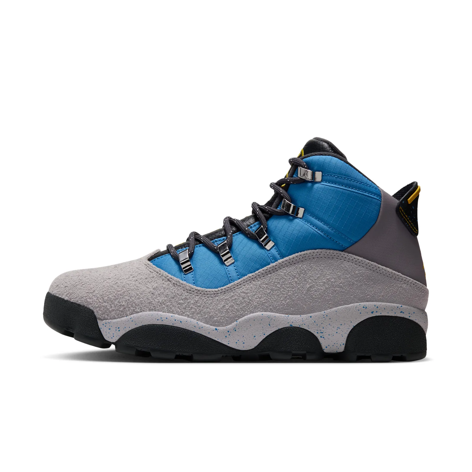 Medial-side view of a blue ripstop and grey suede boot with speckled midsole and silver lace hooks, Cobalt Blue