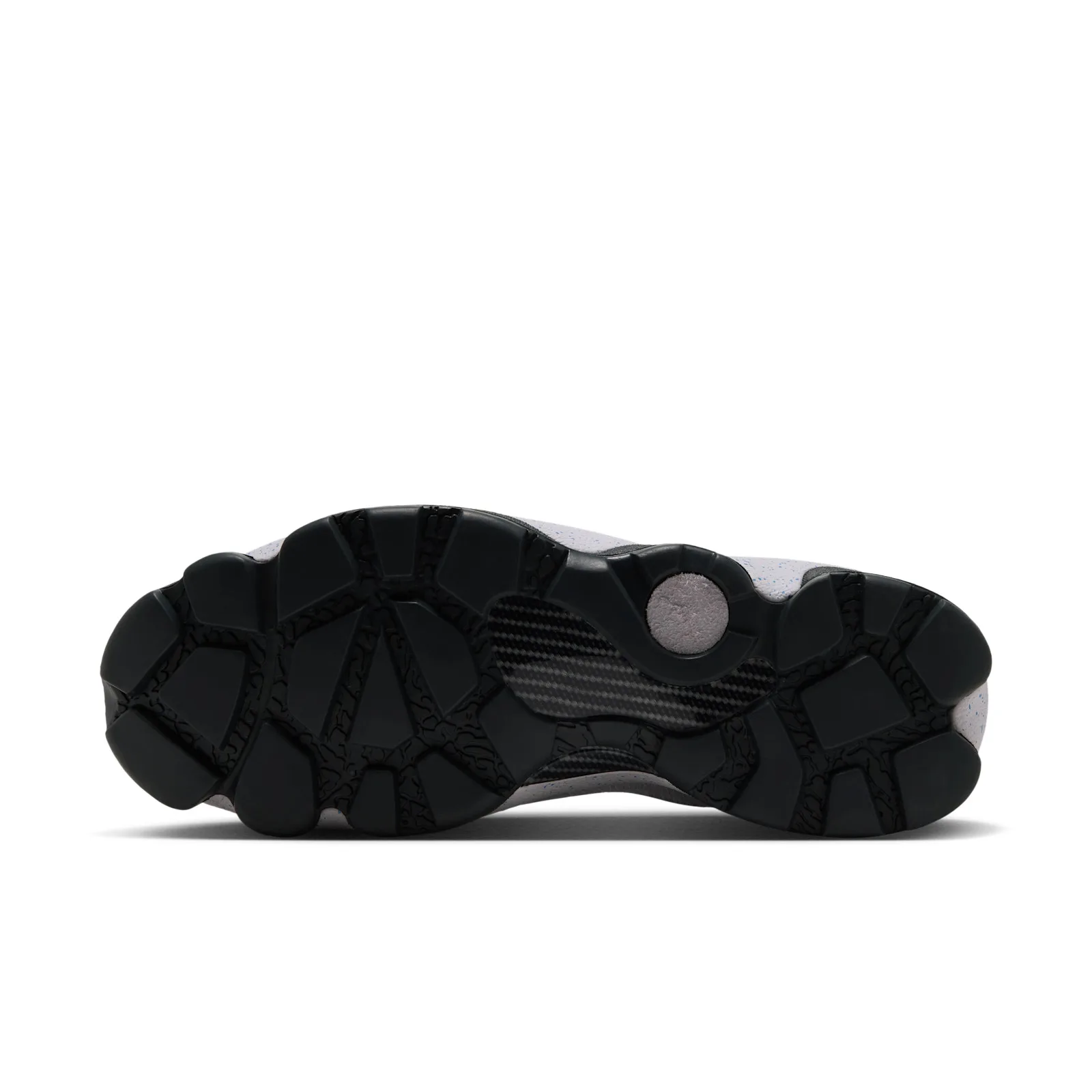 Outsole view with black lugs, carbon-fibre-style plate and a grey circular suede patch, Cobalt Blue