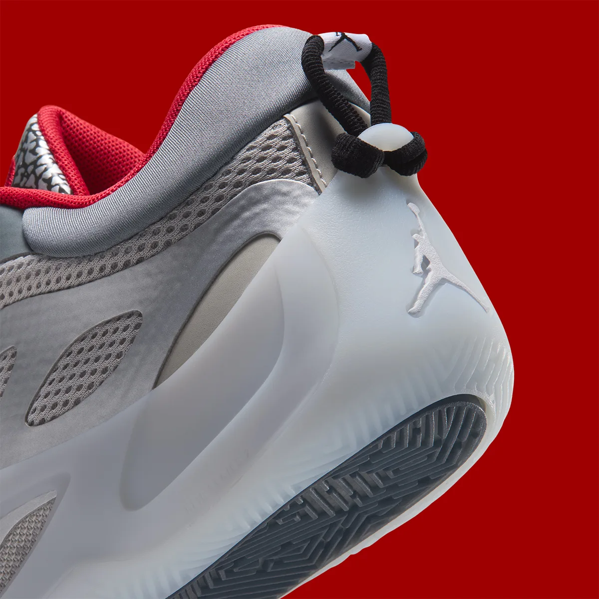 Heel detail with a black pull loop and pale Jumpman on a translucent sole, Elephant Print