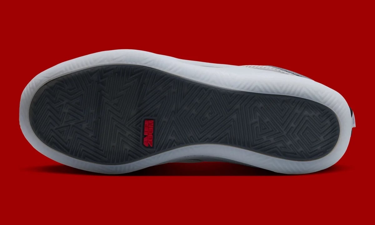 Outsole view with dark geometric tread and a red Zoom Air logo, Elephant Print